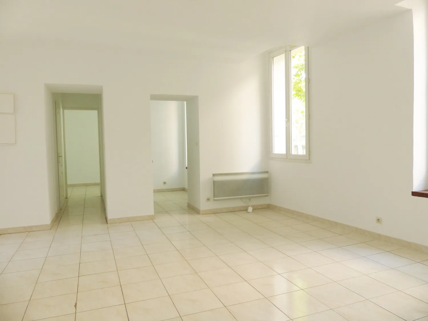 Appartement T3 rénové au cœur de Lamalou-les-Bains avec faibles charges et vue historique