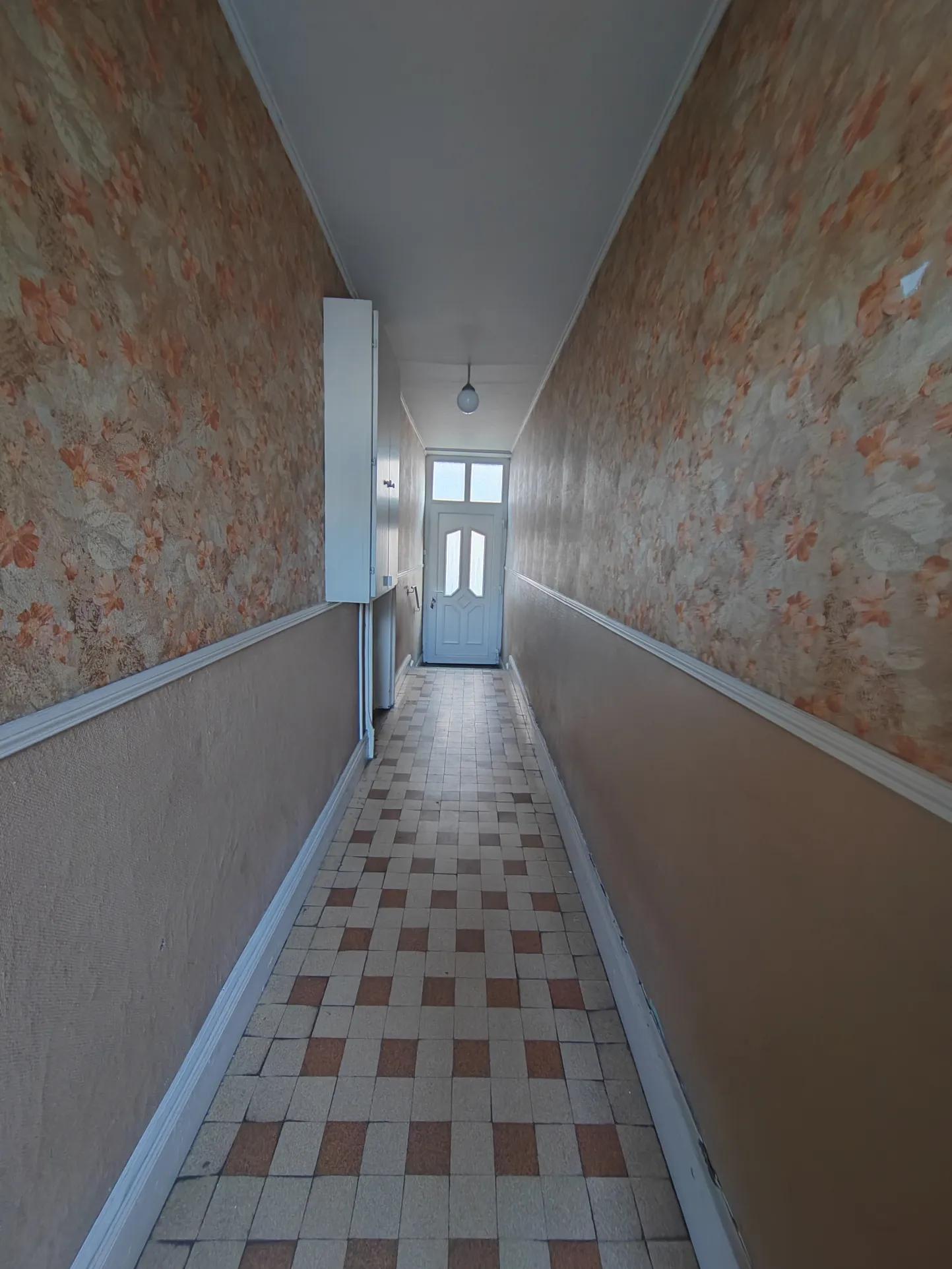 Maison bi-familiale à Riedisheim avec deux appartements, garage et jardin 