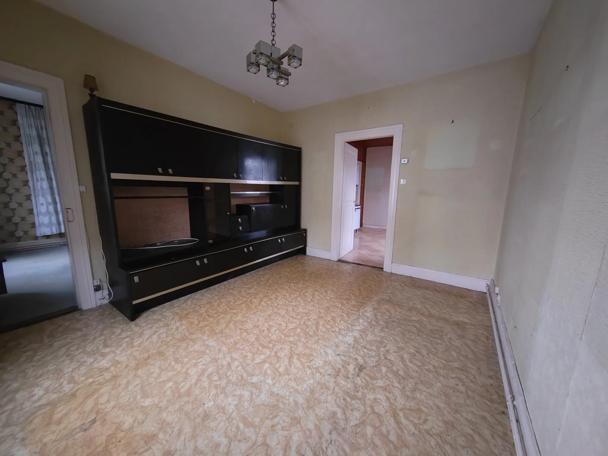 Maison bi-familiale à Riedisheim avec deux appartements, garage et jardin 