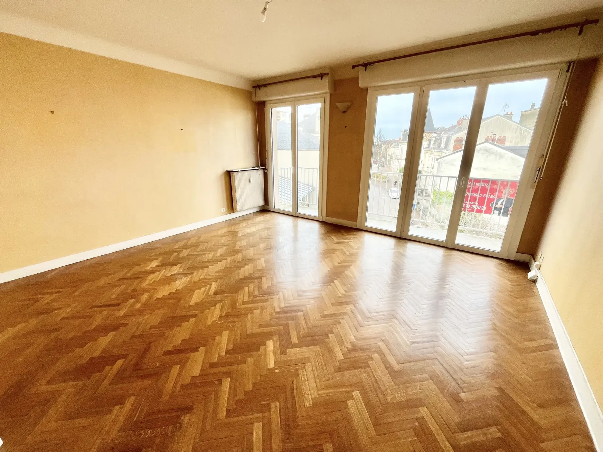 A vendre appartement traversant de 71 m² près du centre de Limoges avec balcon et garage 
