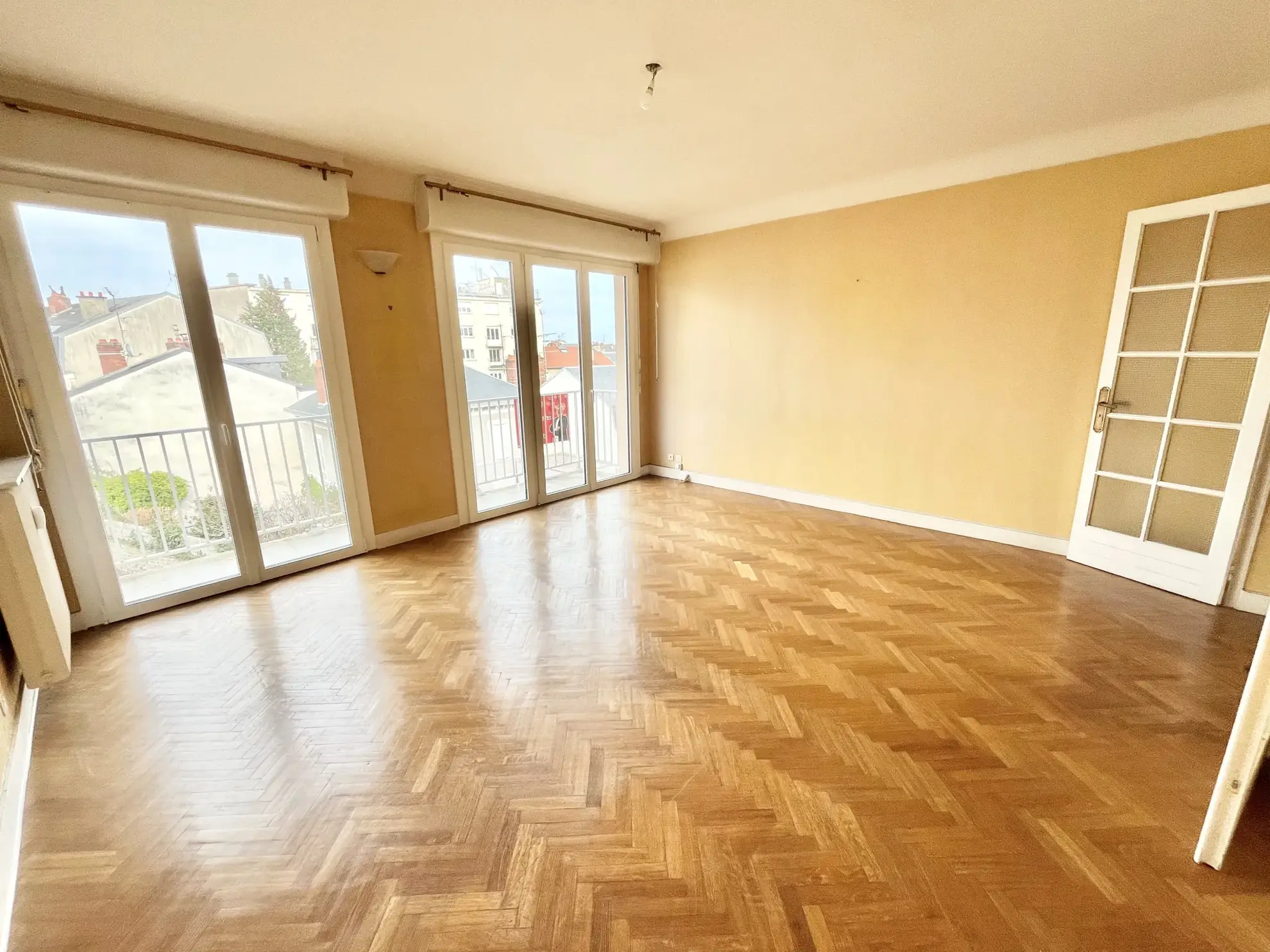 A vendre appartement traversant de 71 m² près du centre de Limoges avec balcon et garage 