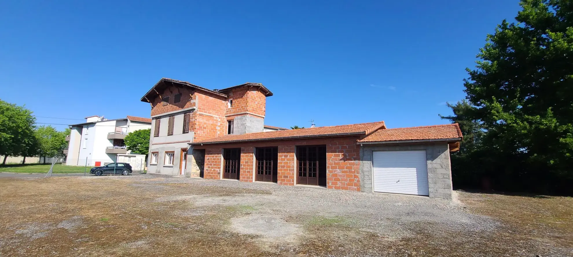 Projet immobilier à Saint-Gaudens (31800) avec grand potentiel - Maison à rénover et terrain 
