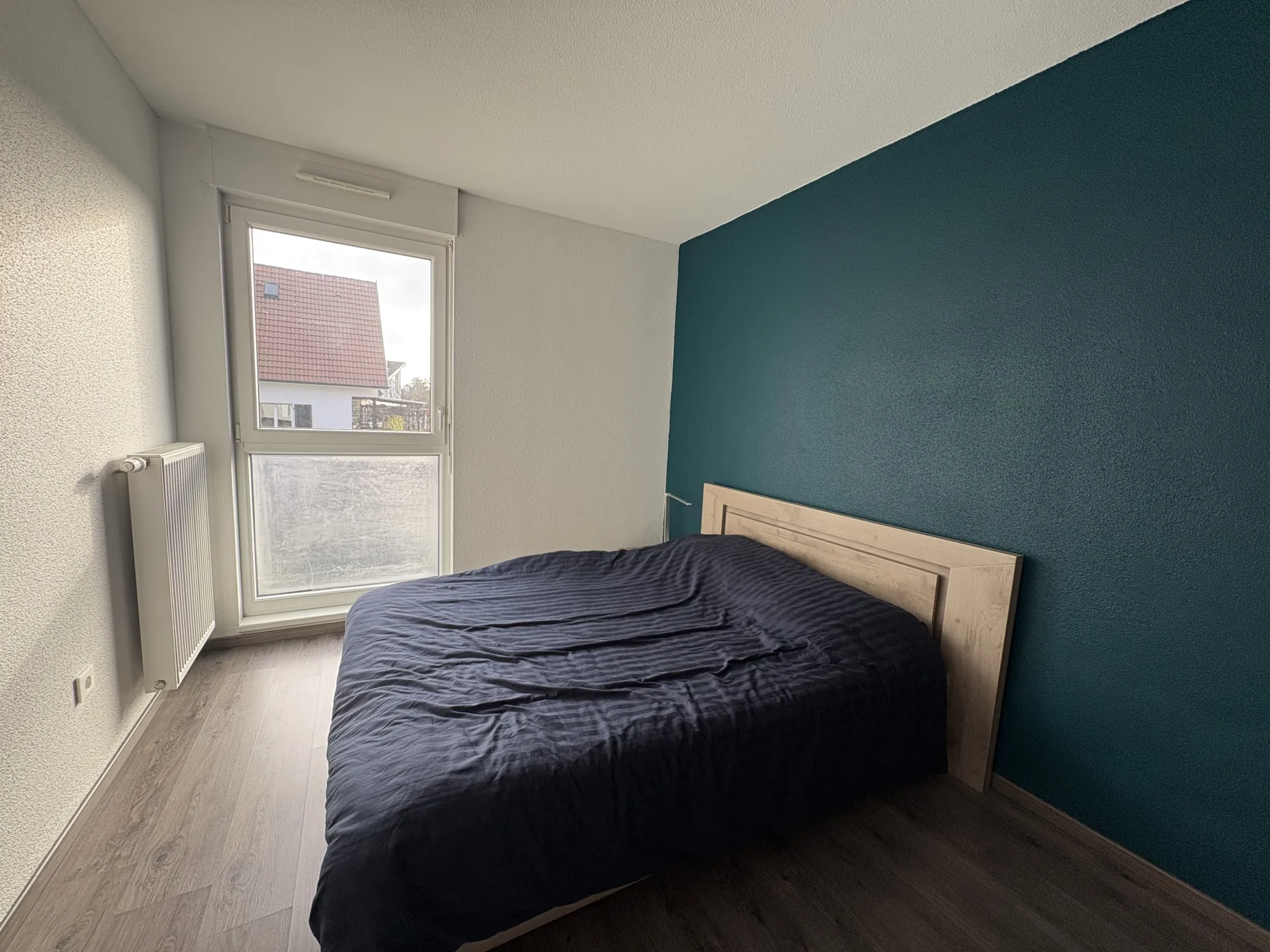 Appartement lumineux de 3 pièces à Kembs avec balcon et parking couvert 