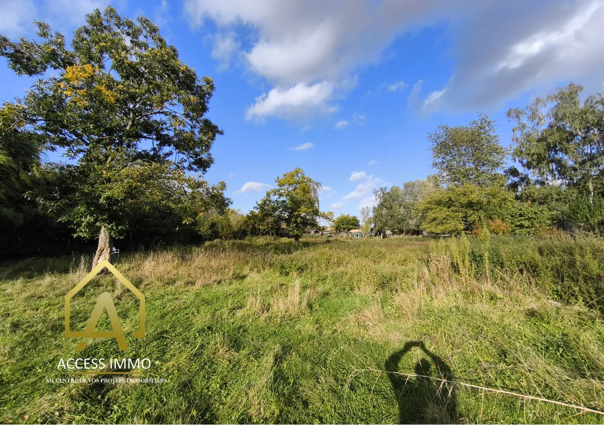 Terrain constructible de 1350 m² à Fresnes-sur-Escaut, idéal pour votre maison