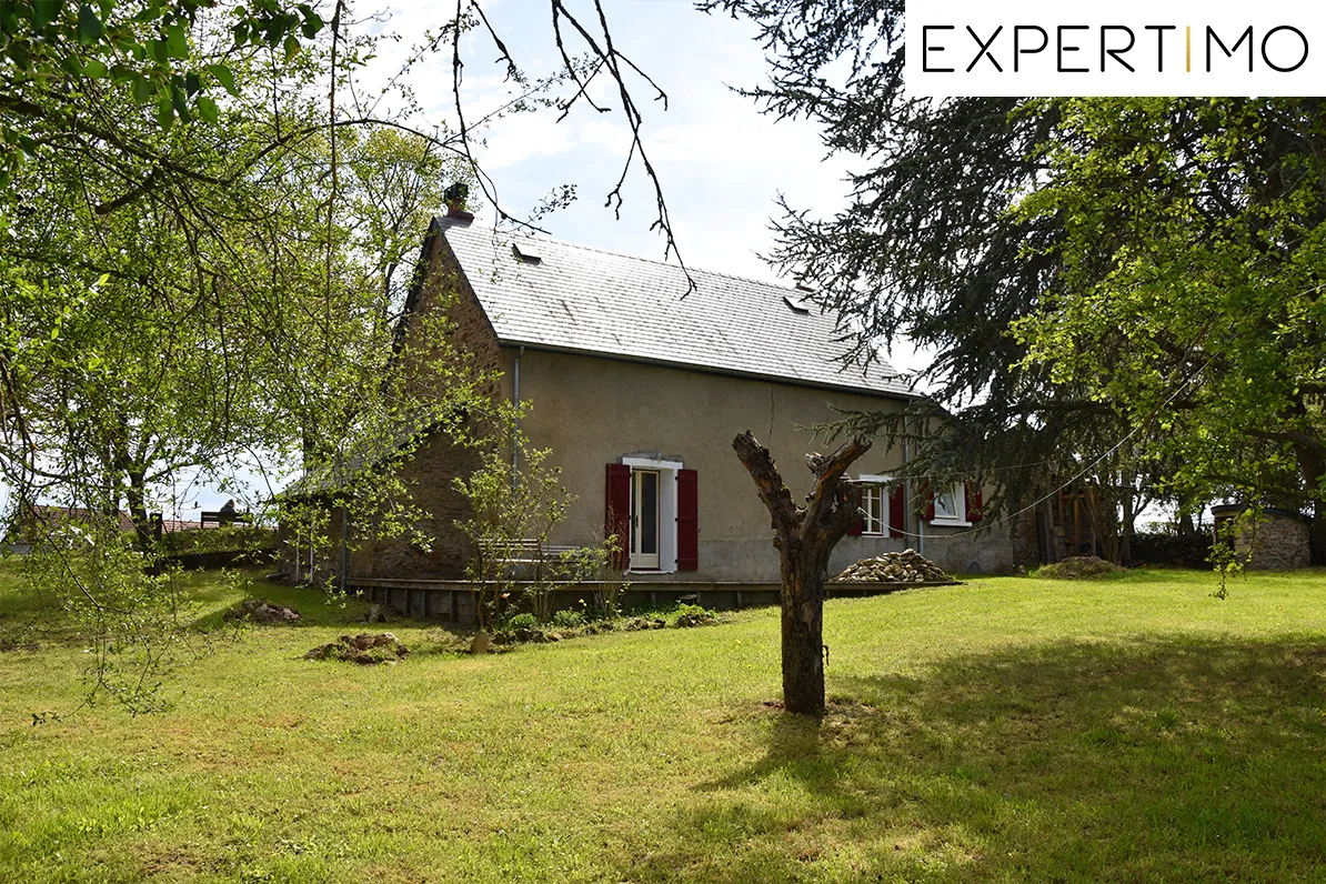 Maison de 102 m² à Menat avec terrain de 2010 m² - charmes et confort 