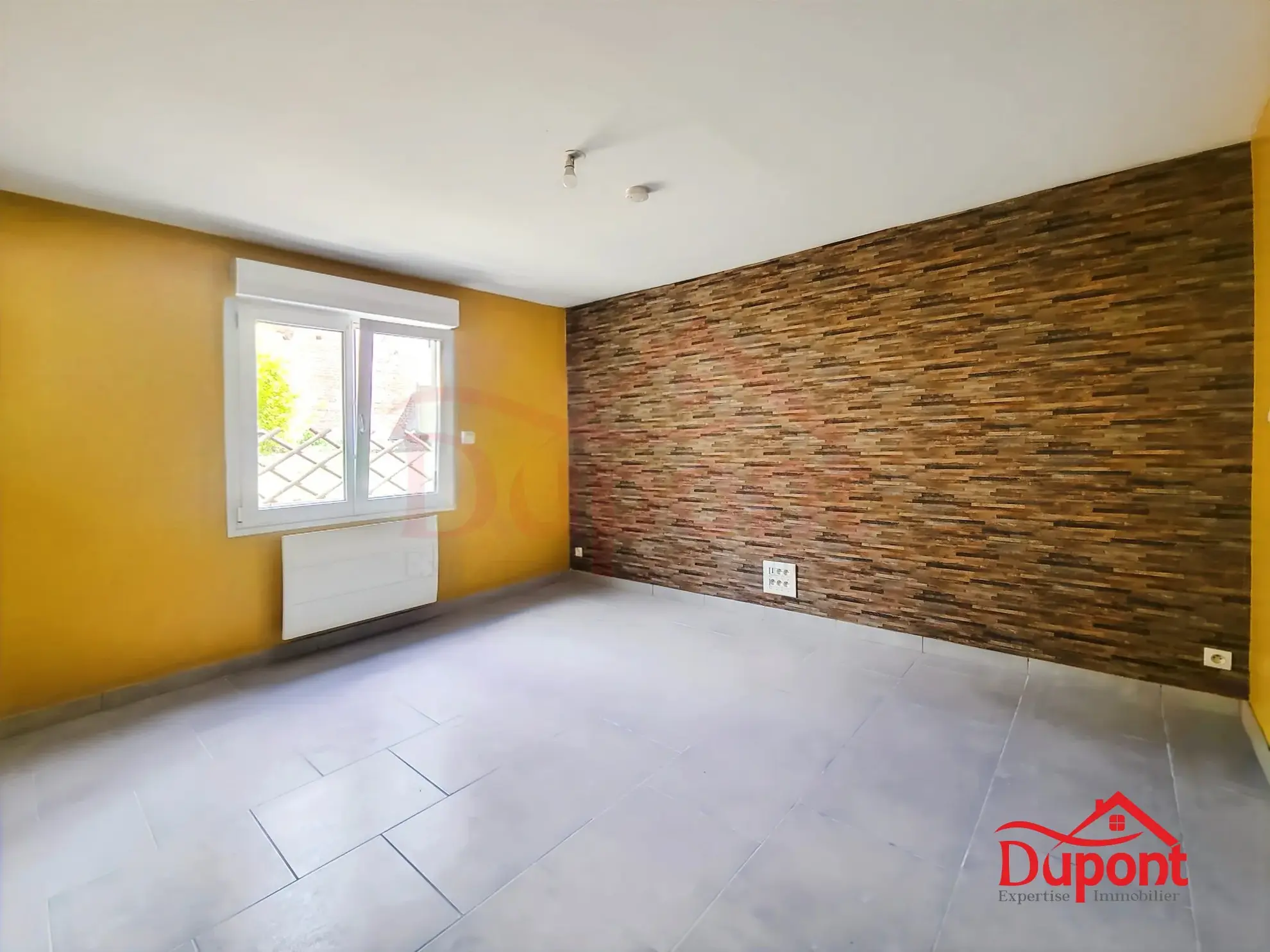 Maison 3 chambres avec garage et jardin à Le Cateau-en-Cambrésis 