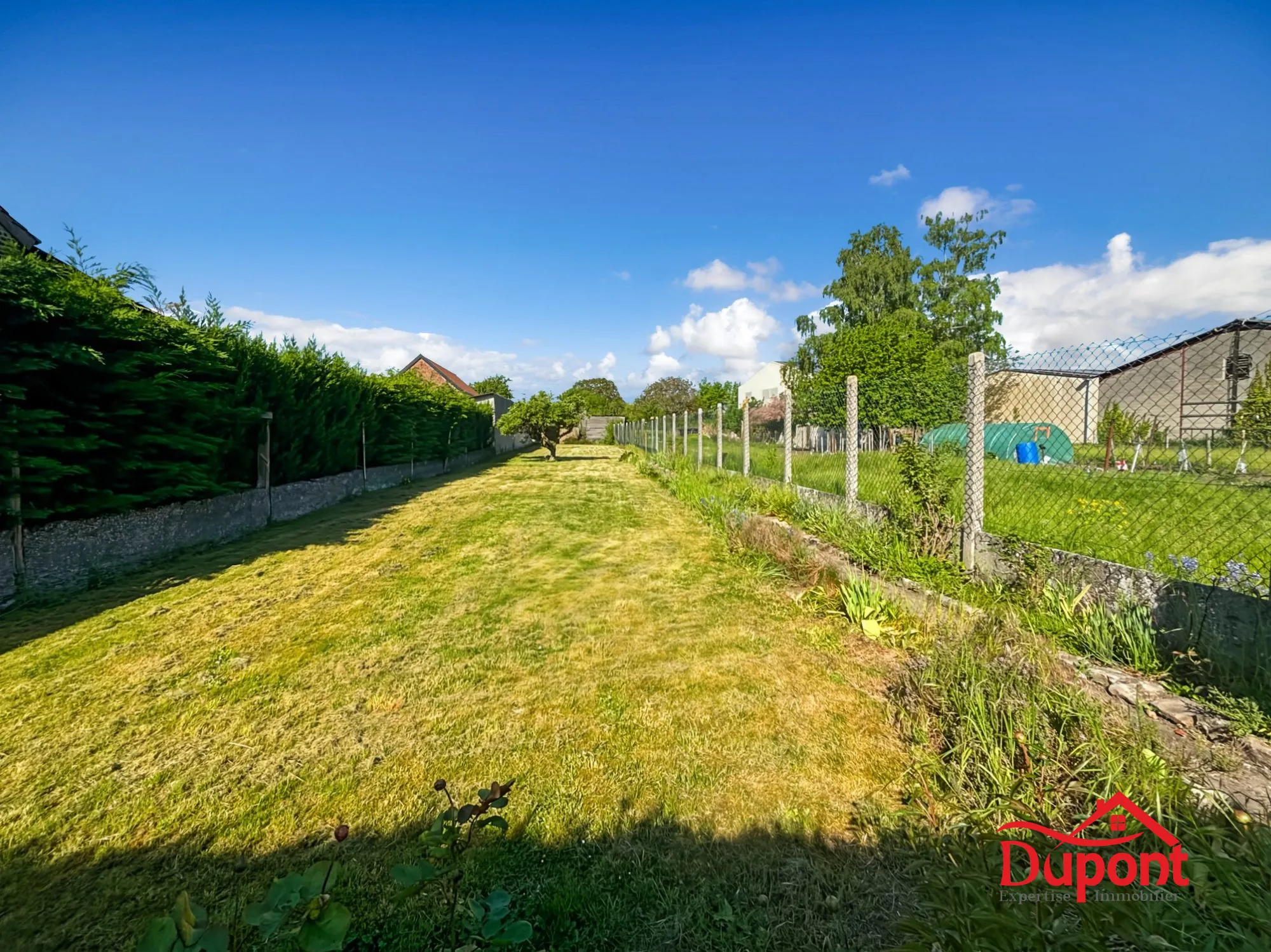 Maison semi-individuelle à Haveluy avec 3 chambres, jardin et potentiel d'extension 