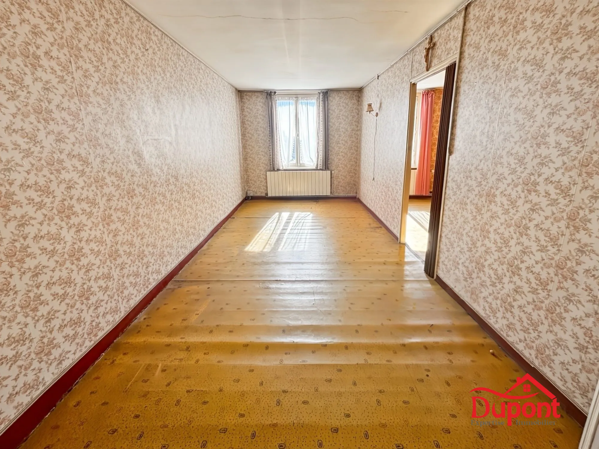 Maison semi-individuelle à Haveluy avec 3 chambres, jardin et potentiel d'extension 