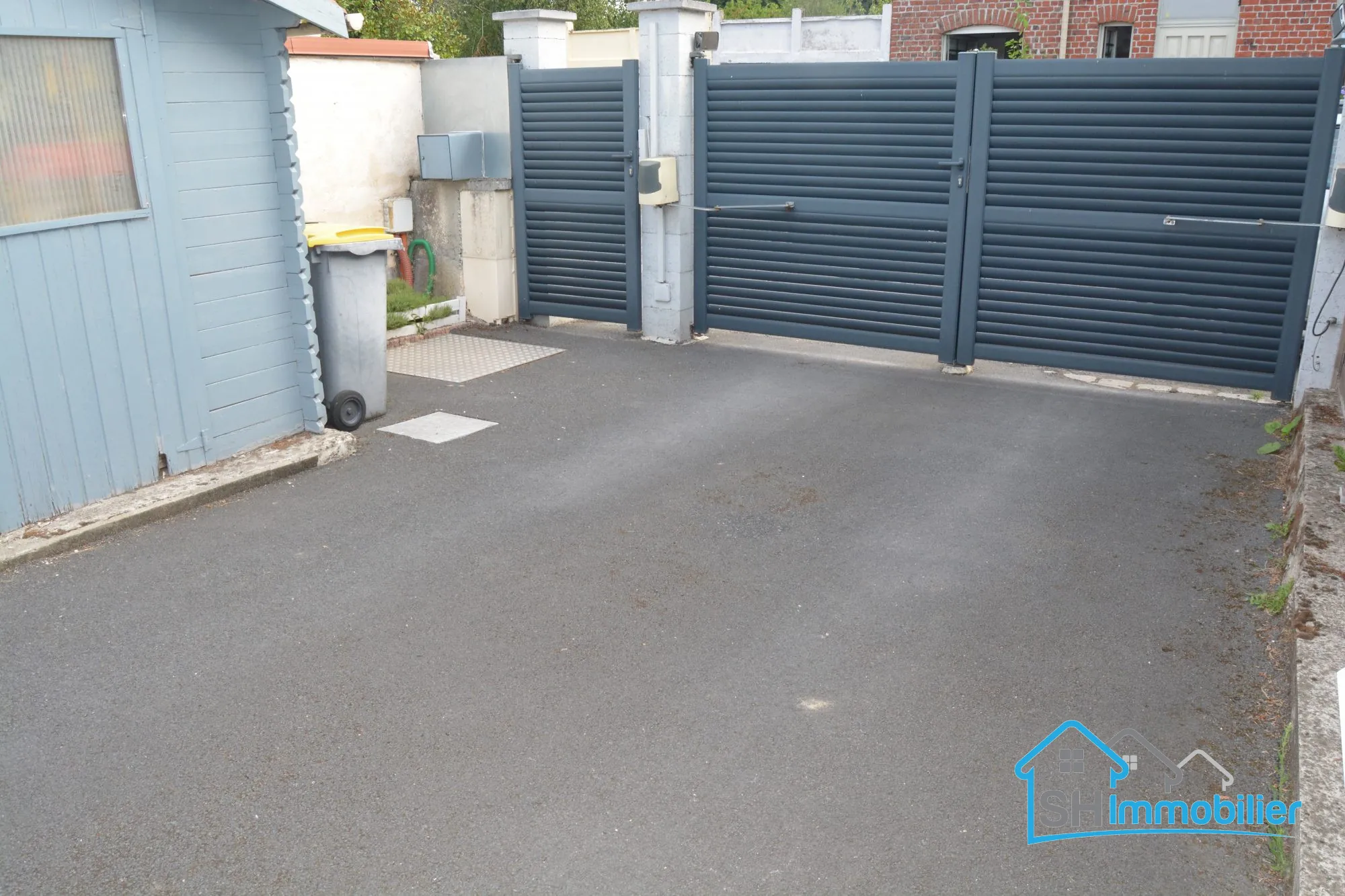 Maison de plain-pied avec 2 chambres, jardin et parking à Wattrelos 