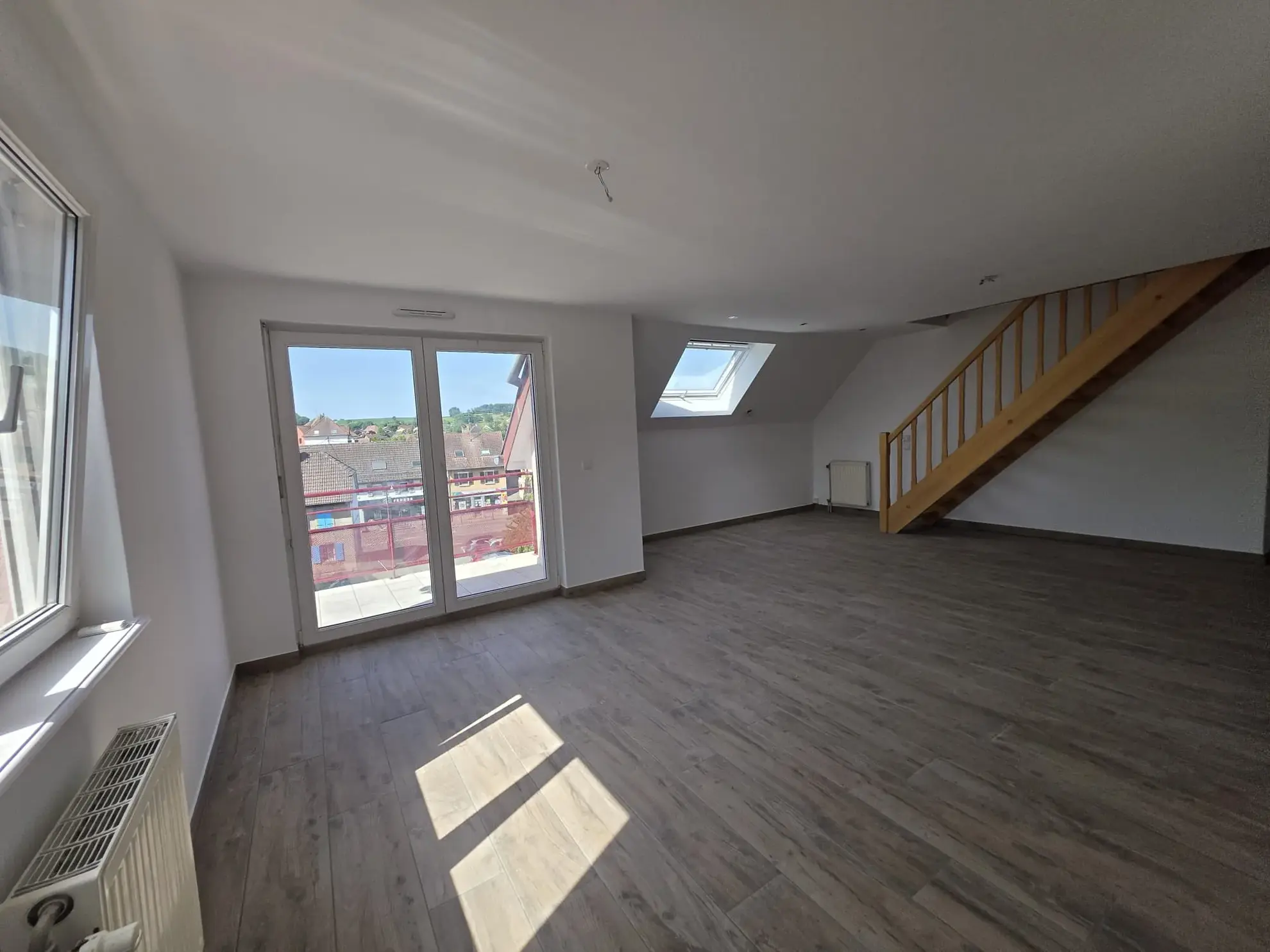 Duplex lumineux de 95m2 à Hirsingue au dernier étage avec garage 