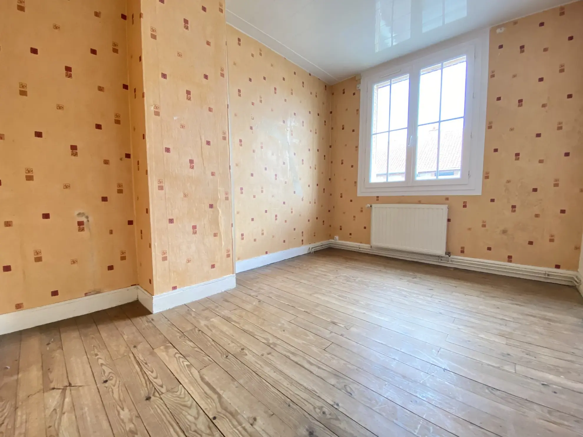 Maison de ville à vendre à Abbeville avec 3 chambres, jardin exposé et cave 