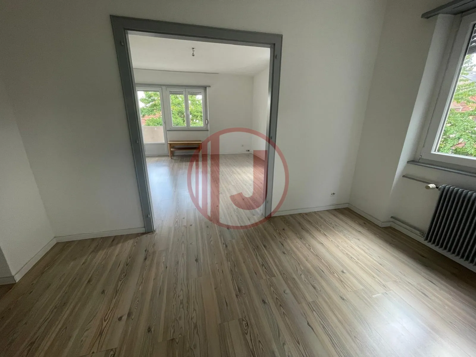 Appartement 4 pièces lumineux avec balcon, parking et cave au Vieux Dornach 