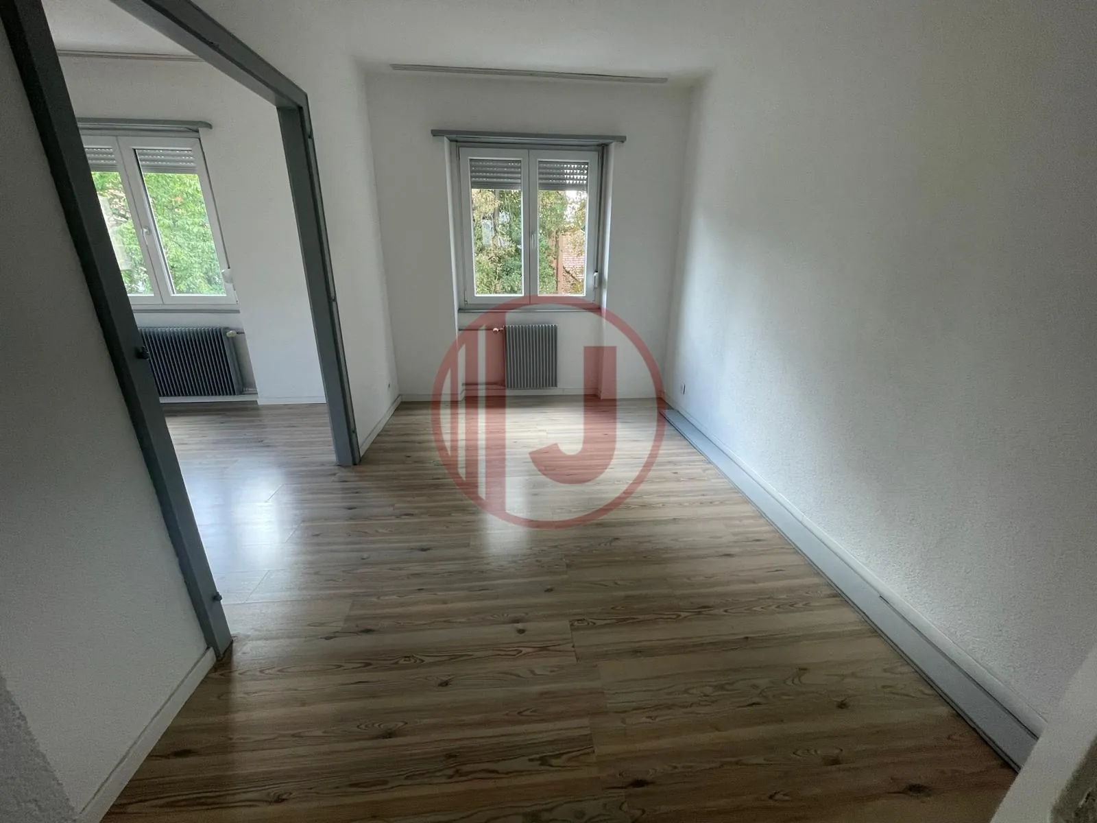 Appartement 4 pièces lumineux avec balcon, parking et cave au Vieux Dornach 