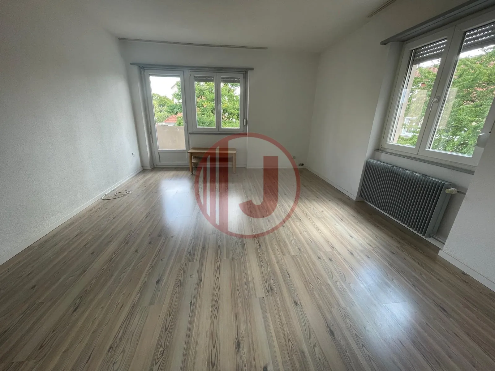 Appartement 4 pièces lumineux avec balcon, parking et cave au Vieux Dornach 