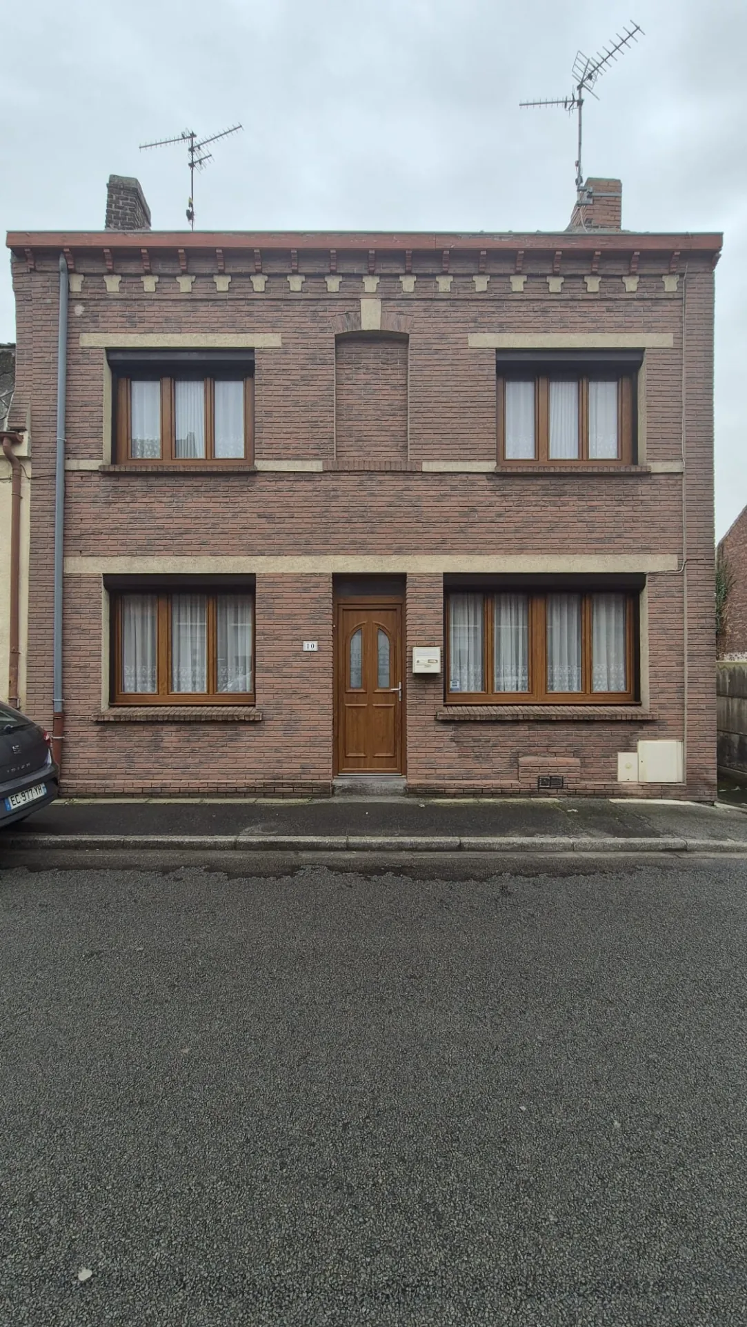 Maison semi-individuelle à Fouquières-Les-Lens avec jardin et potentiel à rénover