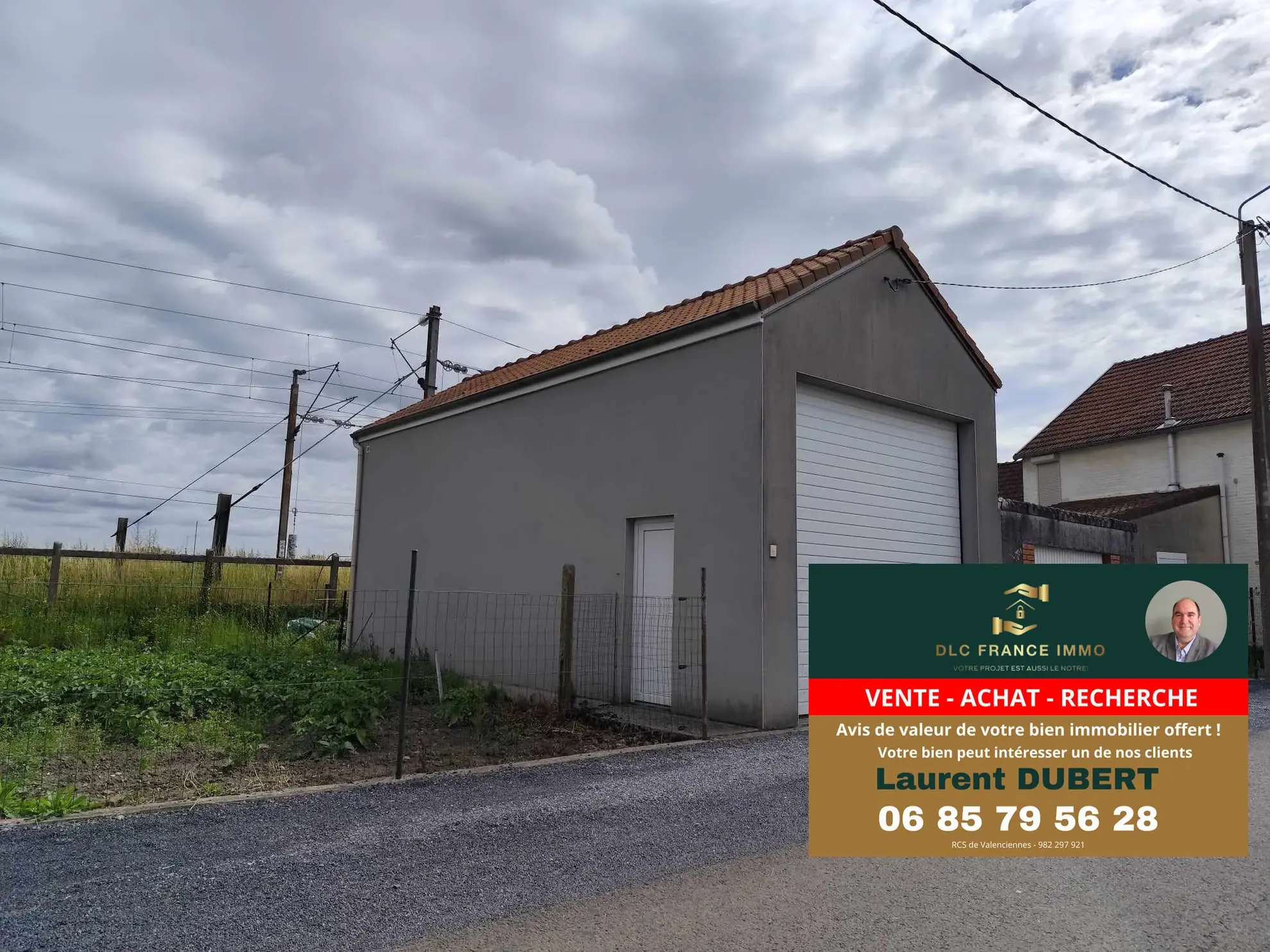 Grand garage de 40 m² à Jolimetz avec terrain constructible 