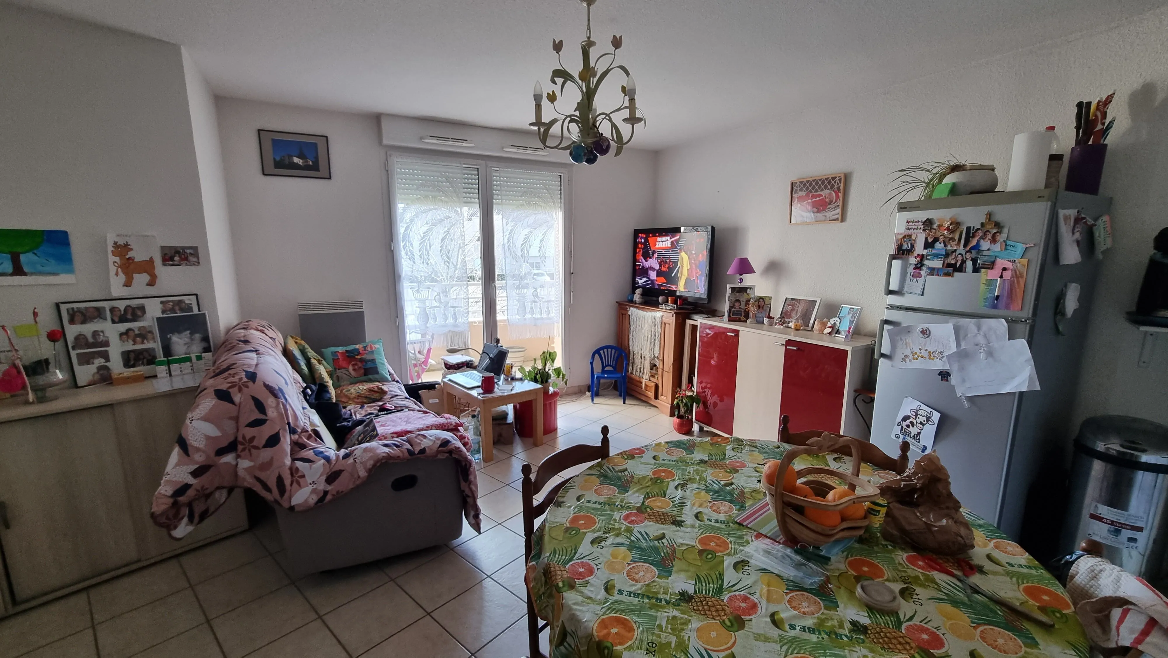 Appartement T3 loué avec balcon et parking à Villerest 