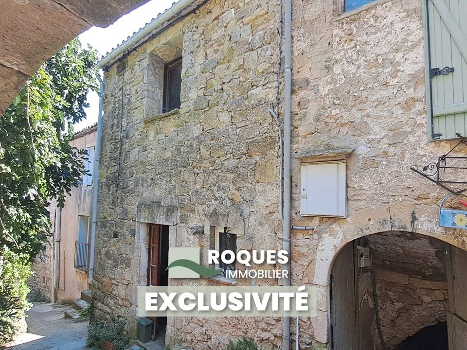 Maison de village à rénover à Lauroux avec jardin et cave