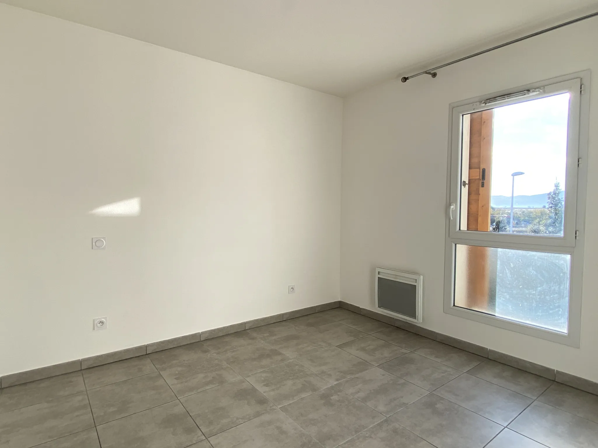 Appartement récent 2 pièces avec terrasse et parking à Perpignan sud 