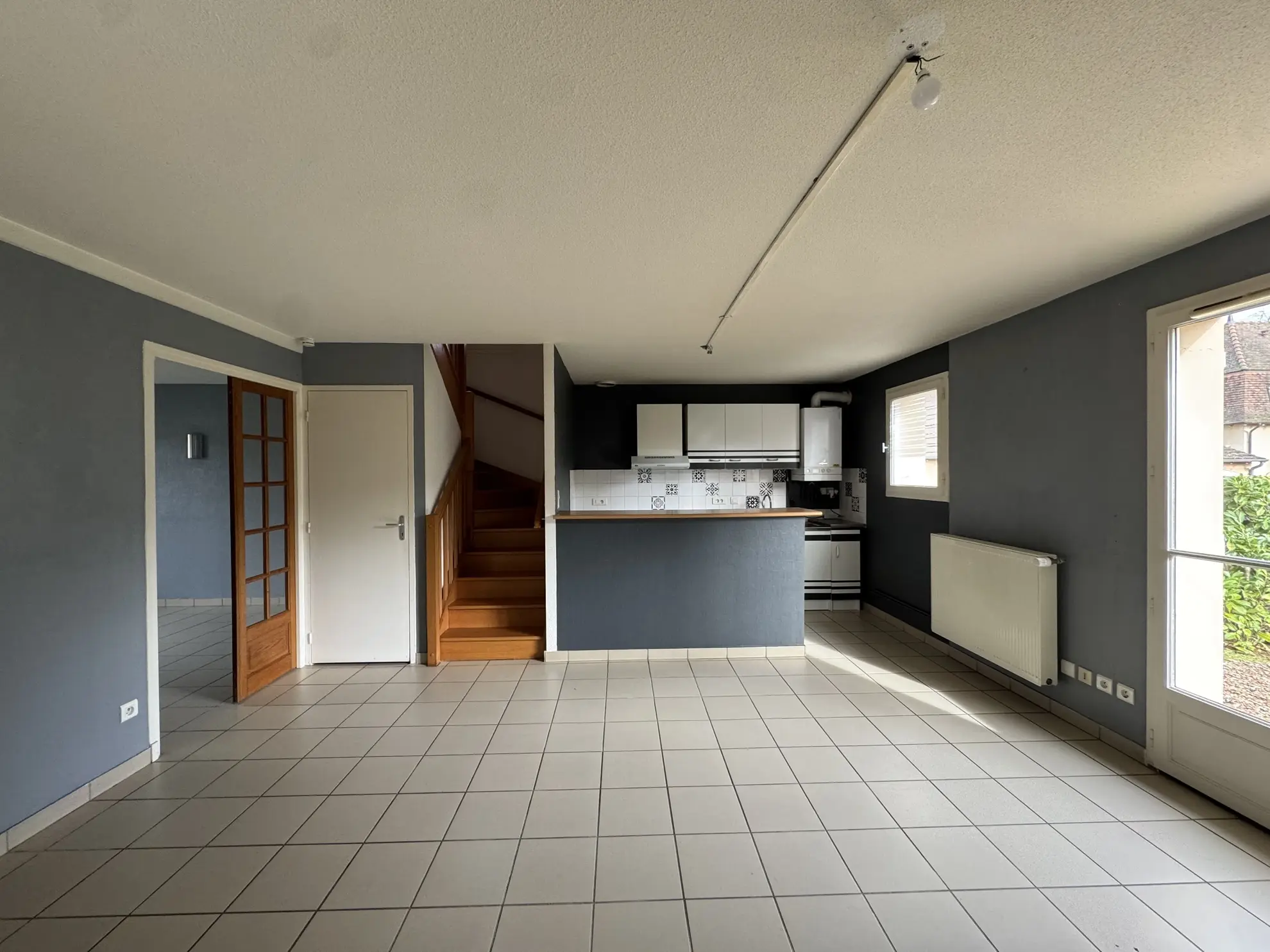 Maison duplex à vendre à Marcigny - 90 m² avec terrain et garage en centre-ville 