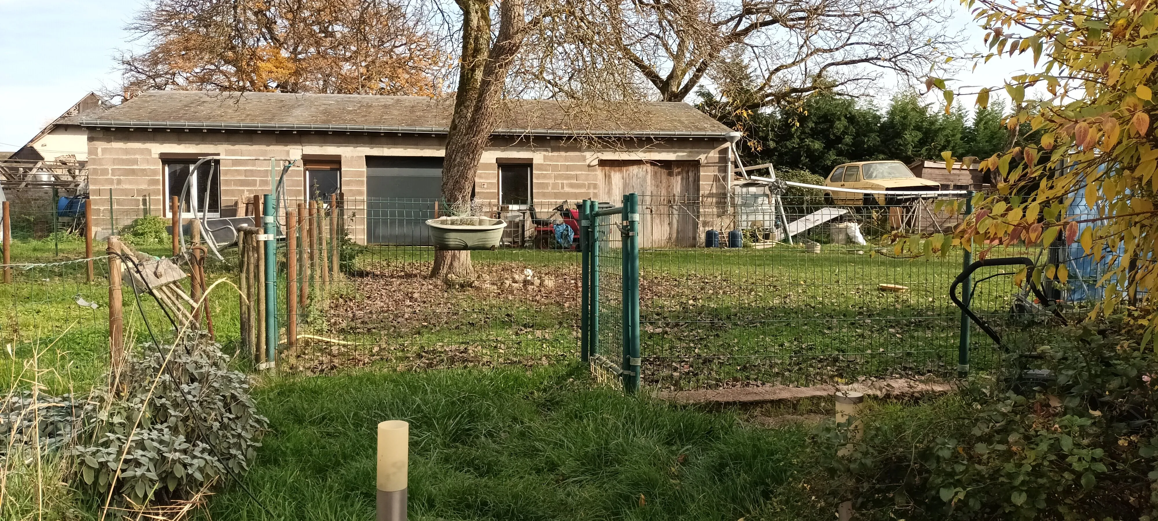 A vendre ensemble immobilier à Chaumont-Porcien avec deux maisons sur grand terrain 