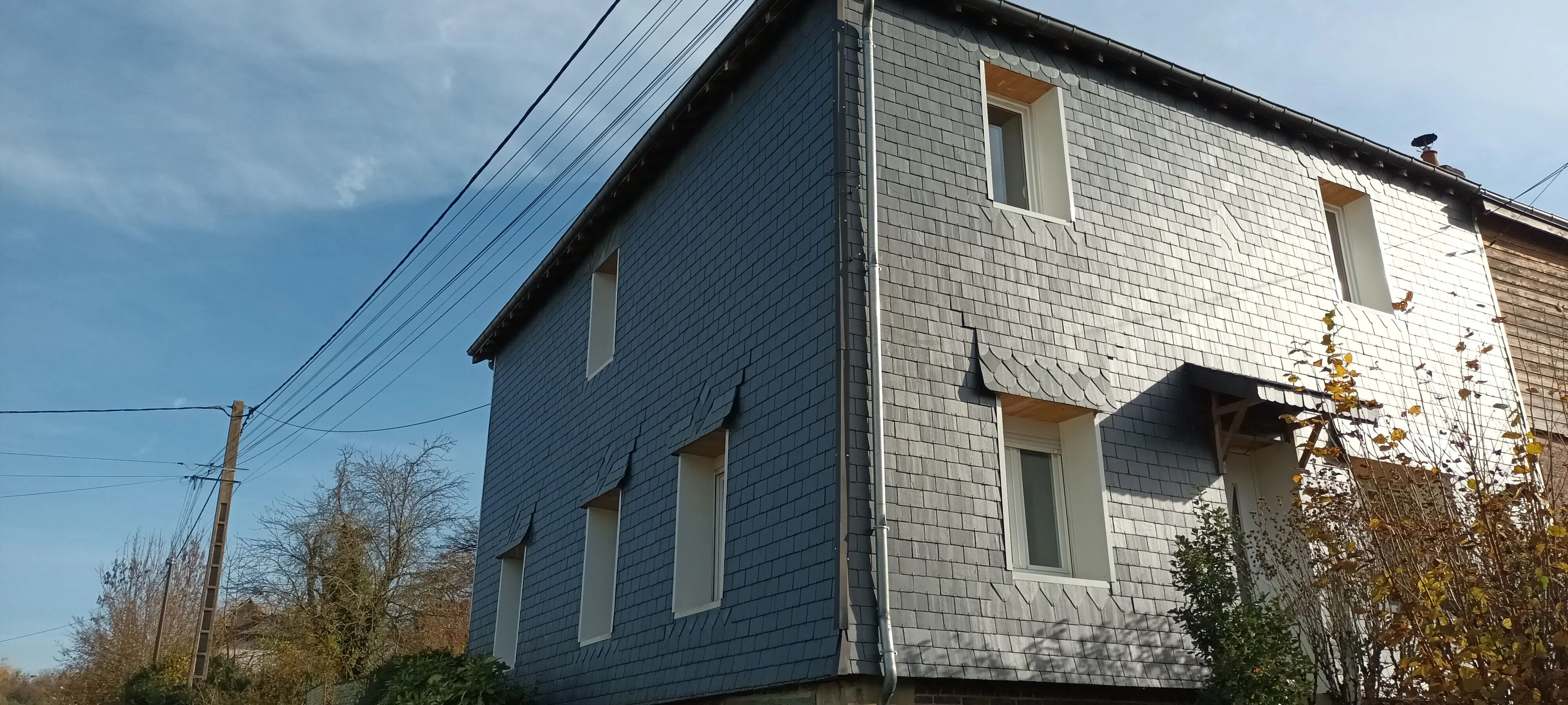 A vendre ensemble immobilier à Chaumont-Porcien avec deux maisons sur grand terrain 