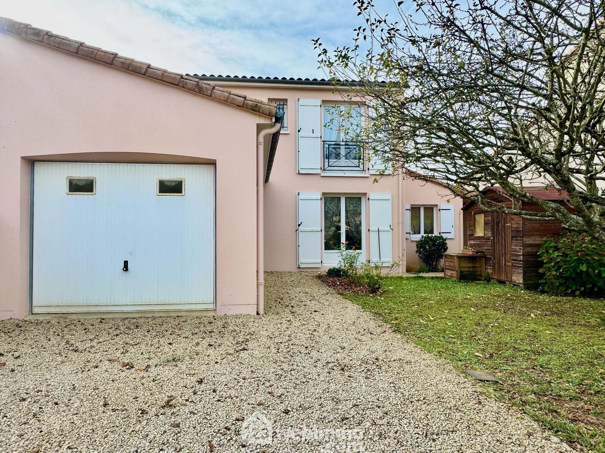 Maison à Buxerolles avec 4 chambres, jardin et garage - 102 m² 