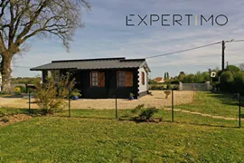 Magnifique chalet en bois rénové avec terrasse et parcelle constructible près de Poitiers 