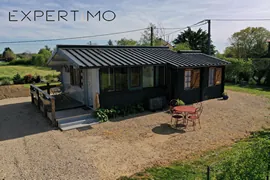 Magnifique chalet en bois rénové avec terrasse et parcelle constructible près de Poitiers 