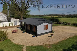 Magnifique chalet en bois rénové avec terrasse et parcelle constructible près de Poitiers 