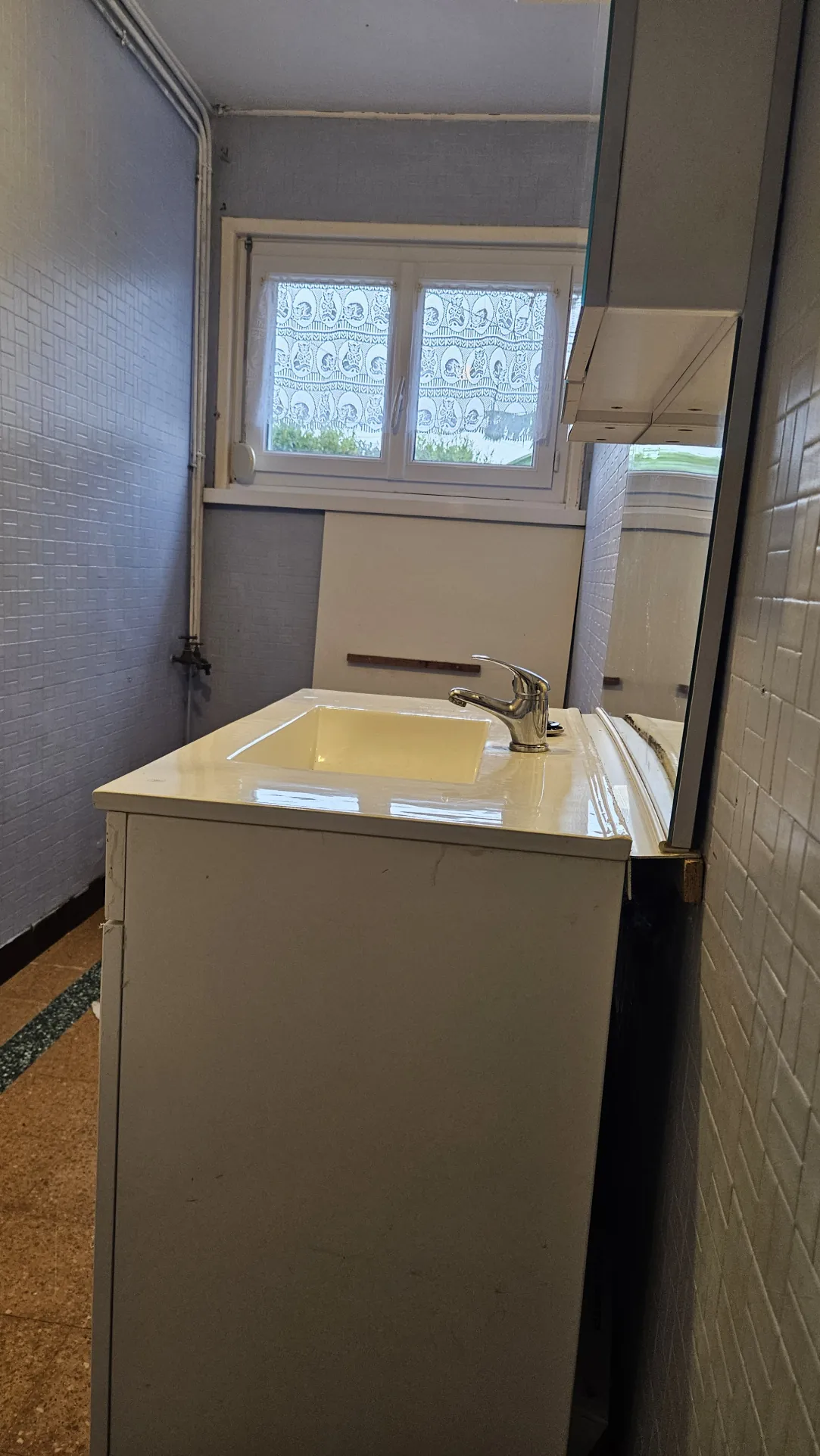 Maison à vendre à Beuvry - Semi-mitoyenne 1950 avec garage et jardin 