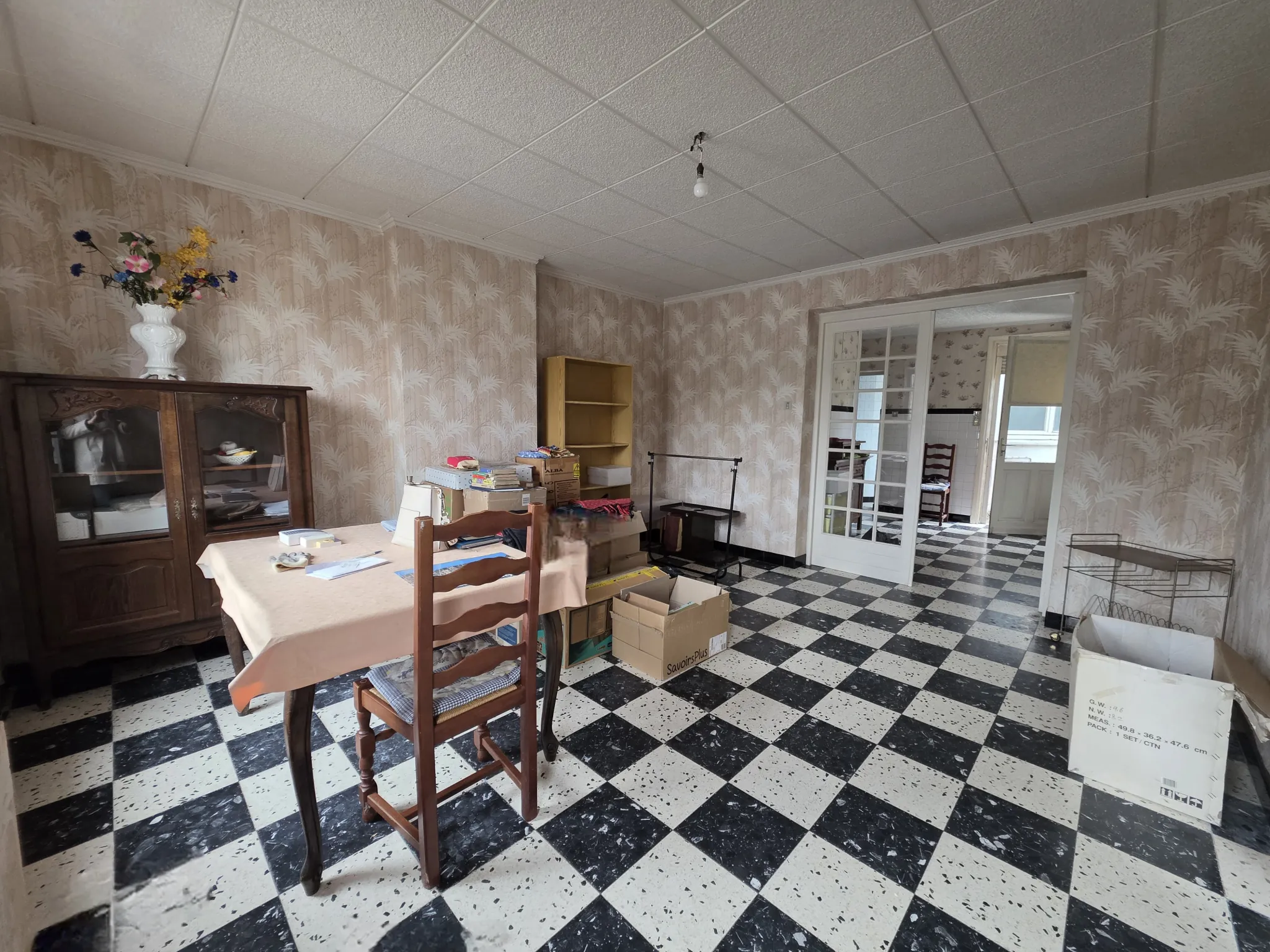 Maison mitoyenne de 96m² à Burbure avec jardin et potentiel d'agrandissement 