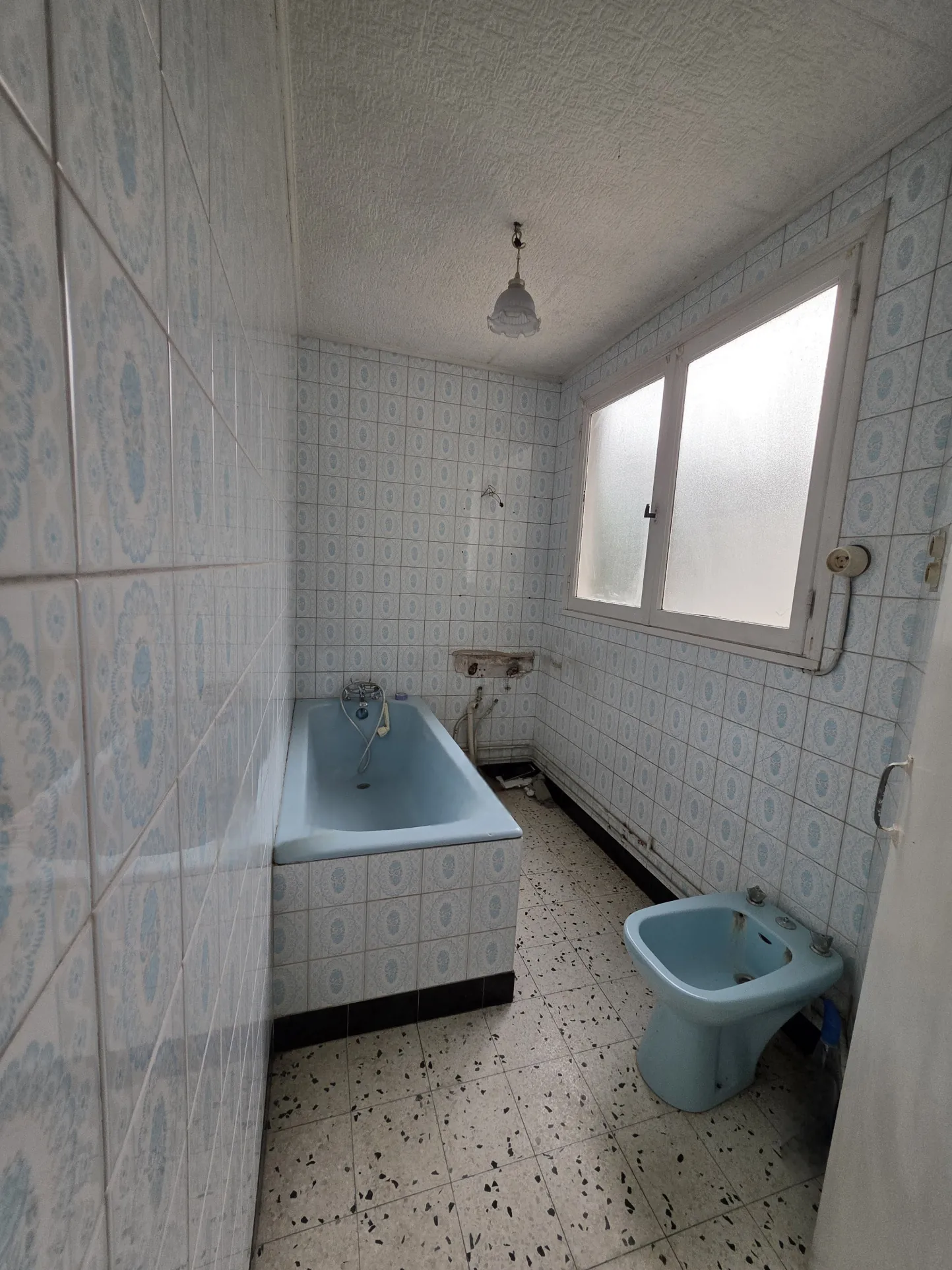 Maison mitoyenne de 96m² à Burbure avec jardin et potentiel d'agrandissement 