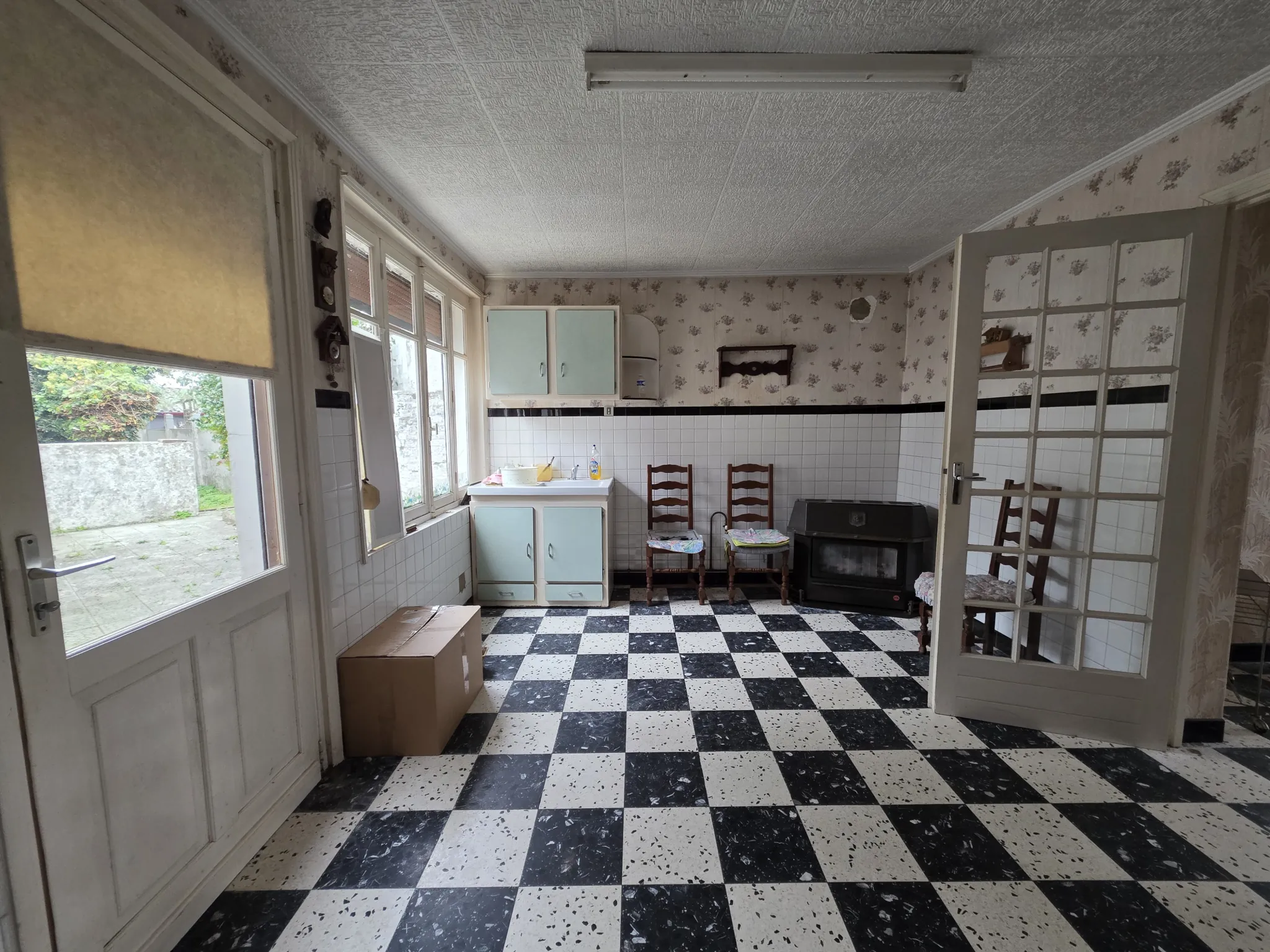 Maison mitoyenne de 96m² à Burbure avec jardin et potentiel d'agrandissement 