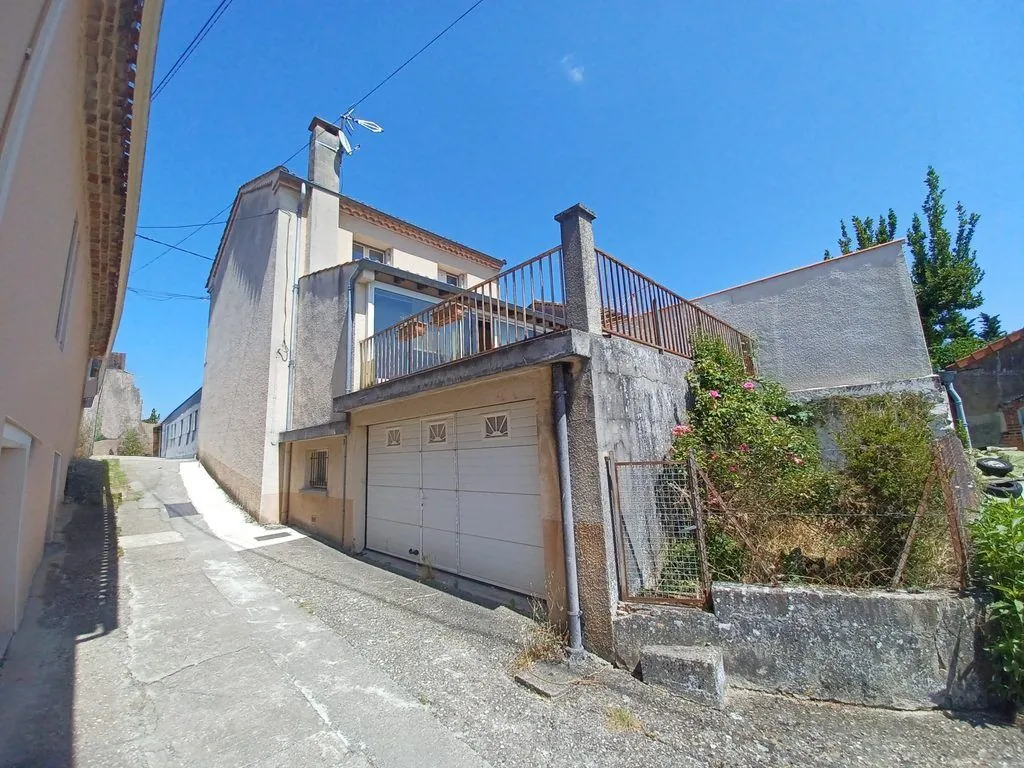 Maison ancienne à rénover de 79 m² à Réalmont avec terrasse et garage