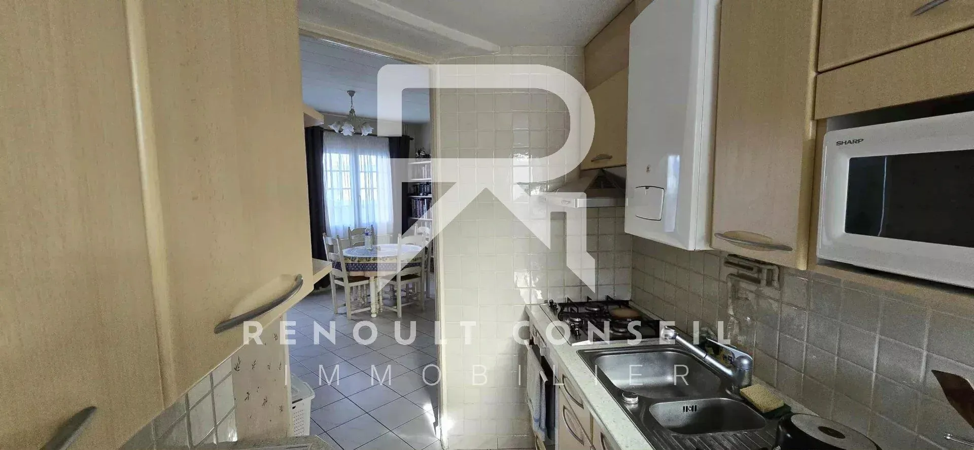 Maison de ville avec garage à Sotteville-lès-Rouen – 54 m², 2 chambres, proche commodités 