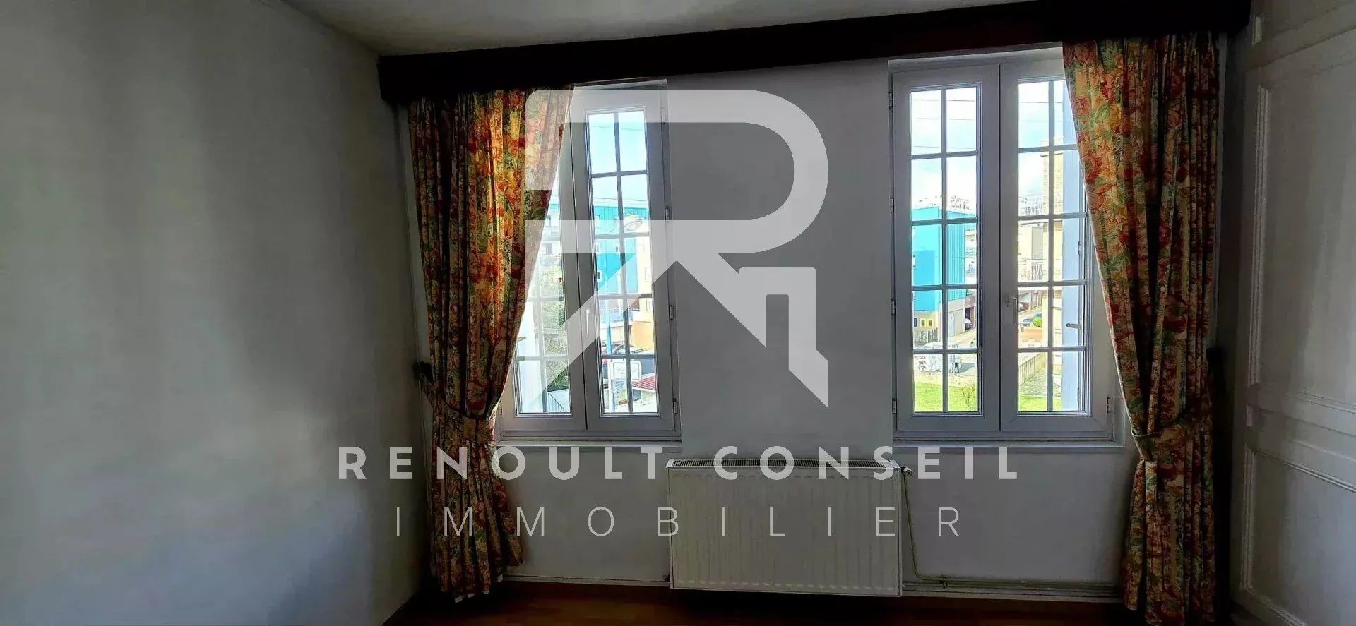 Maison de ville avec garage à Sotteville-lès-Rouen – 54 m², 2 chambres, proche commodités 