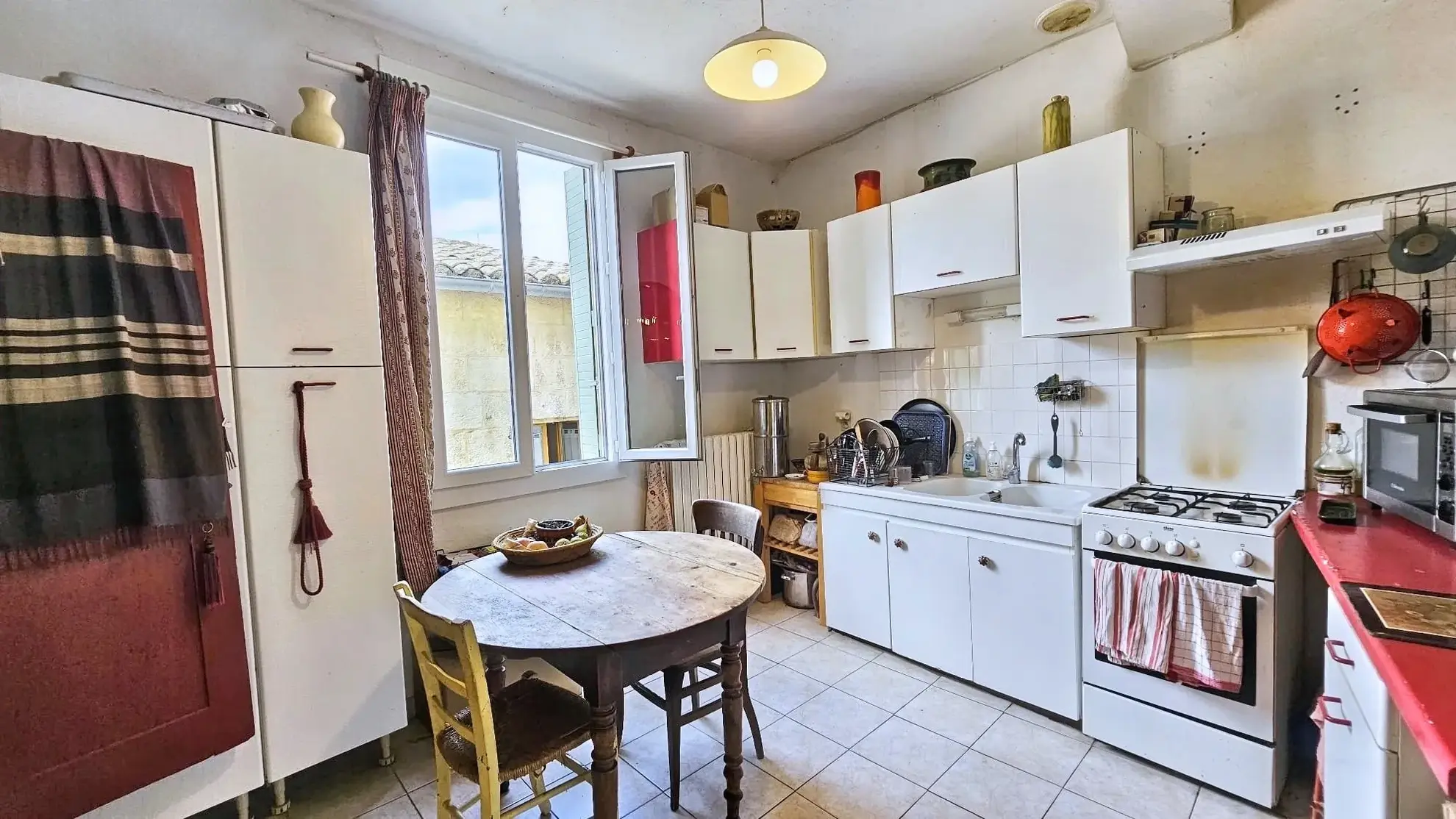 Maison de village de 130 m² en centre historique à Sommières, 6 pièces à rafraîchir 