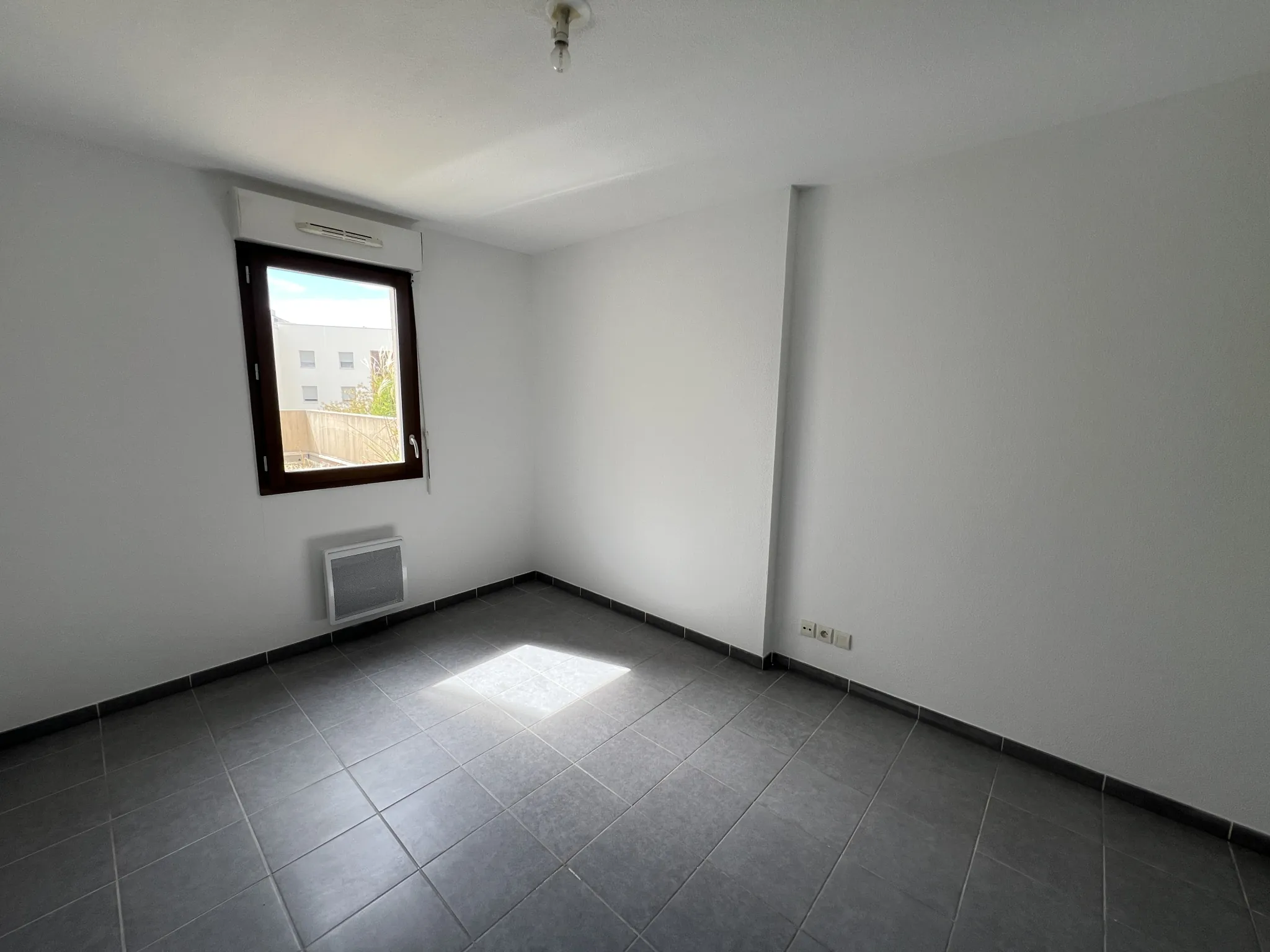 Appartement 3 pièces à vendre à Montpellier centre avec terrasse et garage sécurisé 