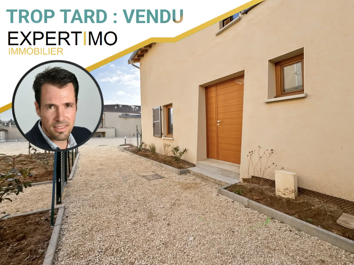 Duplex à aménager avec jardin en plein centre de Sainte Euphémie, proche Trévoux