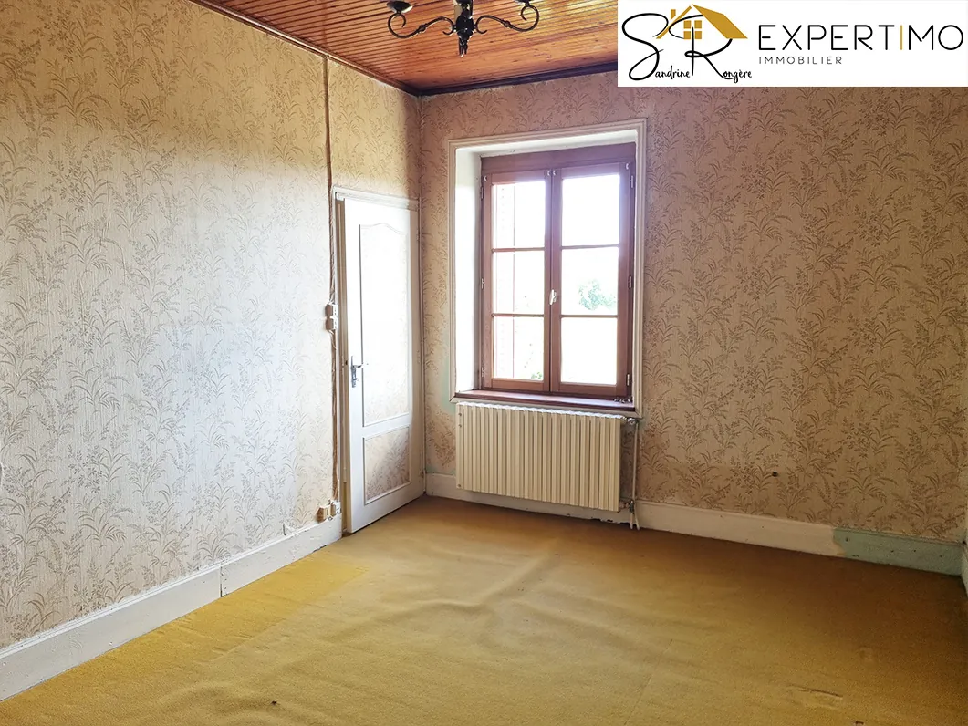 Maison à Sainte-Christine de 102 m² avec grand terrain de 13 180 m² à vendre 