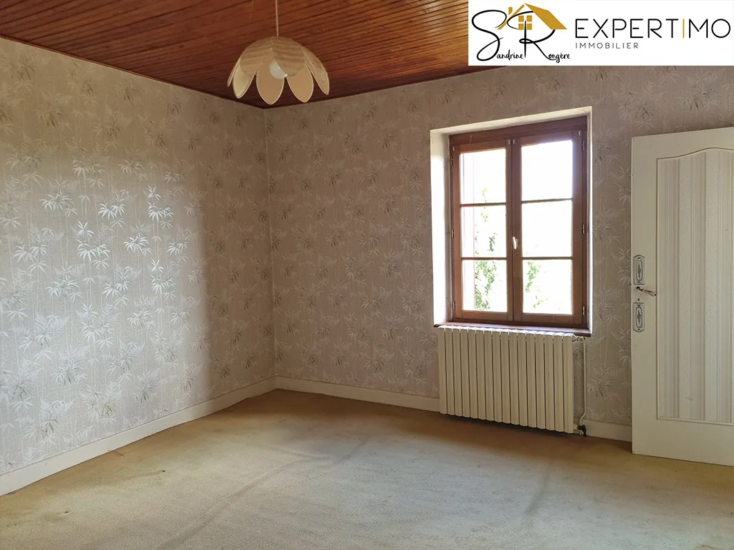 Maison à Sainte-Christine de 102 m² avec grand terrain de 13 180 m² à vendre 