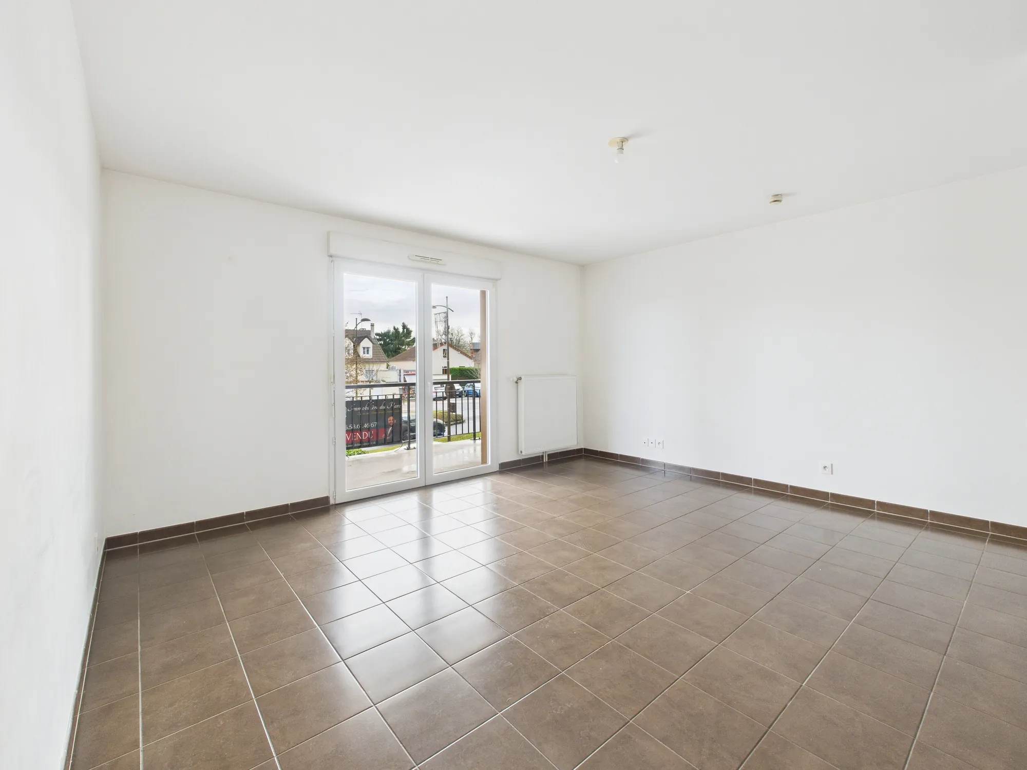 Appartement 2 pièces lumineux à Arpajon, 46,48 m² avec parking en centre-ville 