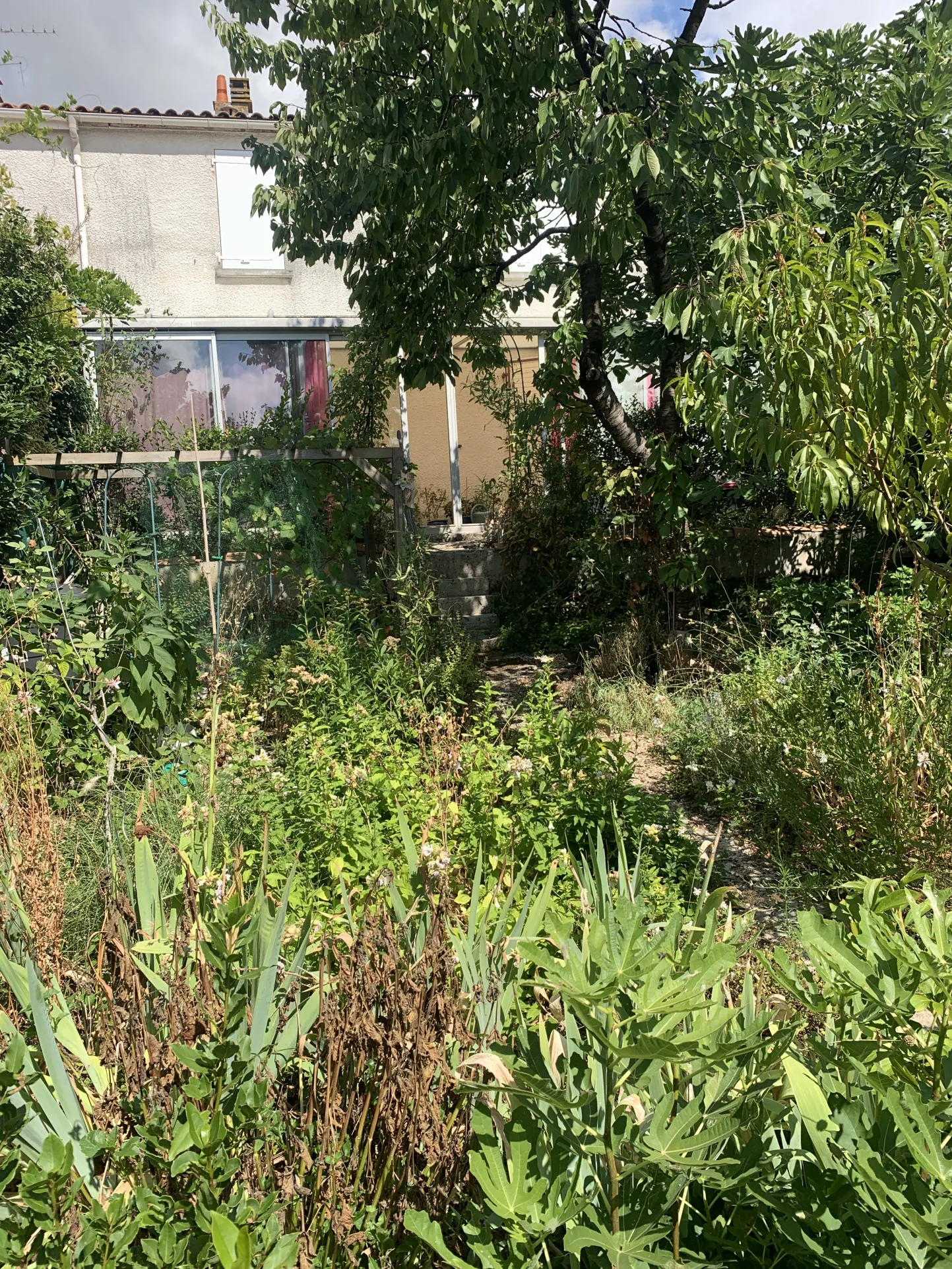 Maison 4 pièces à Saint-Jean-d'Angély – 92 m² avec jardin et garage 