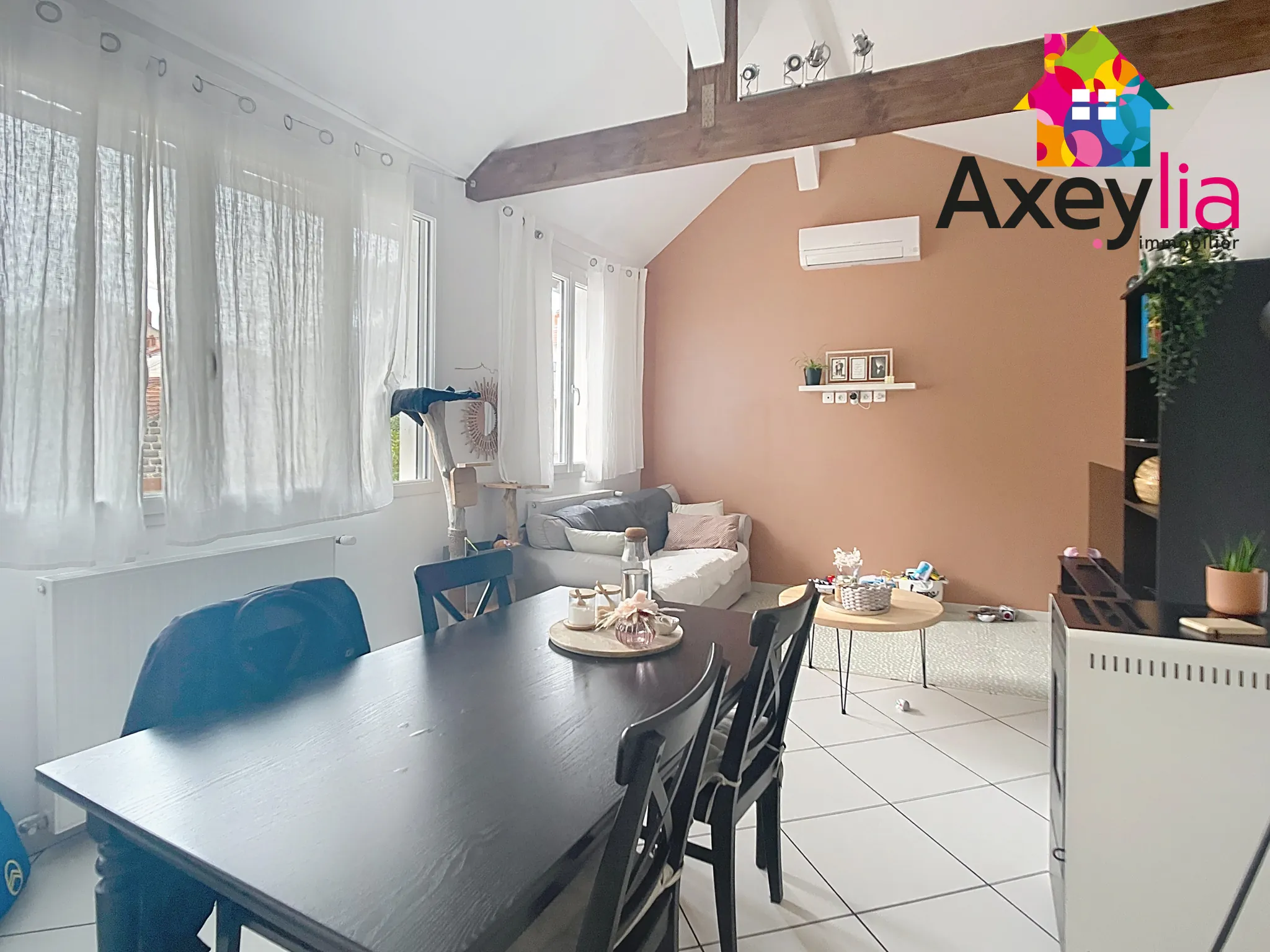 Appartement duplex en centre-ville de Roanne avec 2 chambres, terrasse et caves