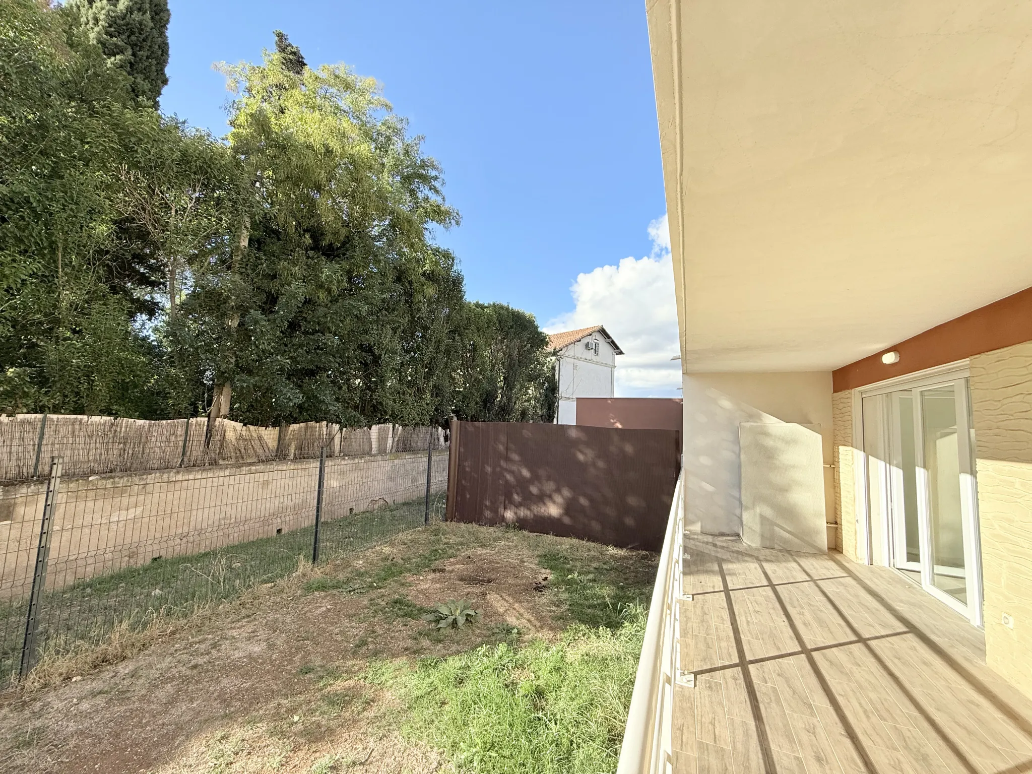 Appartement T3 avec jardin, terrasse et garage à Lunel – 63 m²