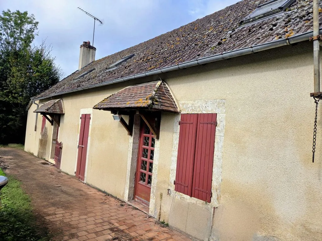 Maison avec dépendances sur 7 hectares clôturés à Cuffy