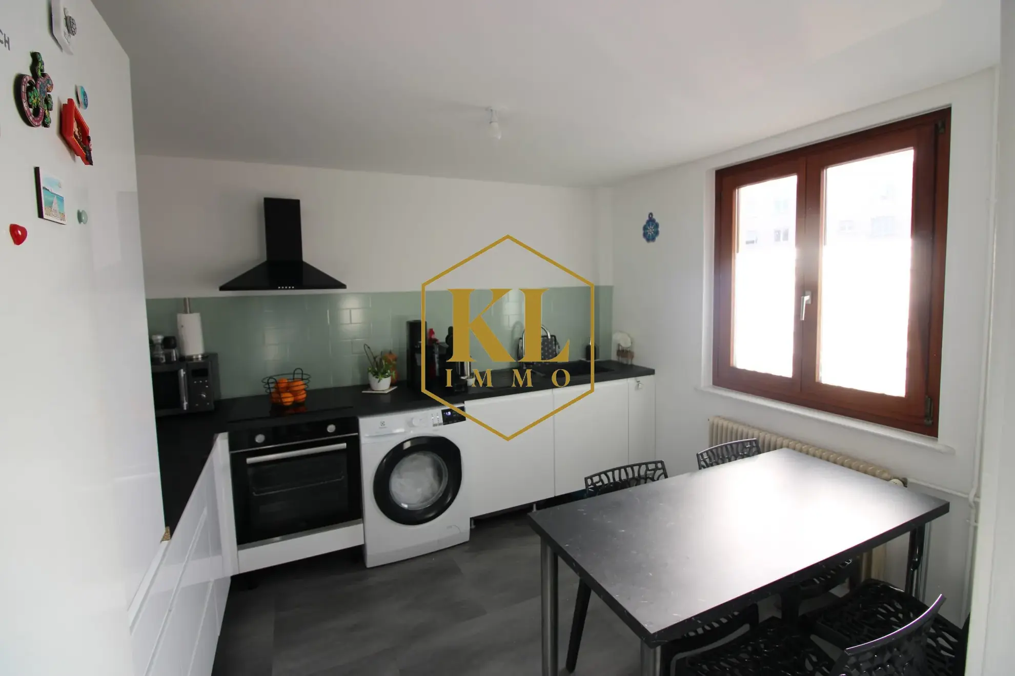 Maison de ville rénovée de 62 m² avec jardin et garage à Colmar 
