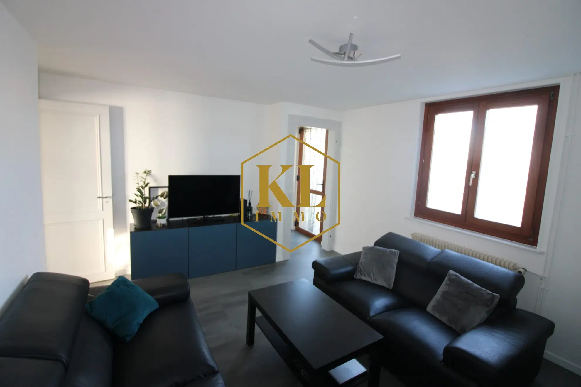 Maison de ville rénovée de 62 m² avec jardin et garage à Colmar 