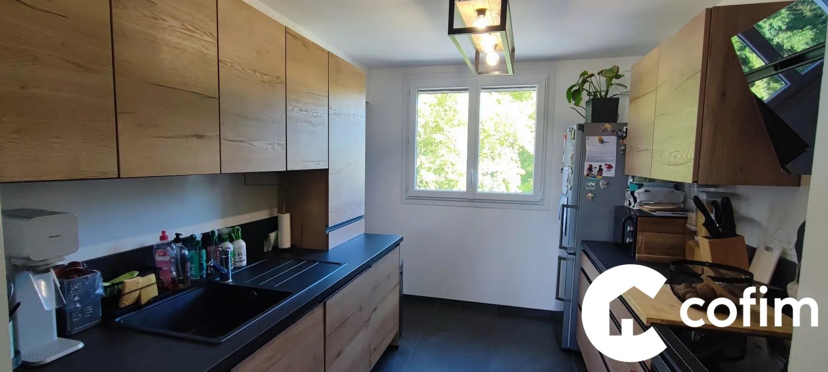 Appartement à vendre à Gelos avec parking et vue dégagée